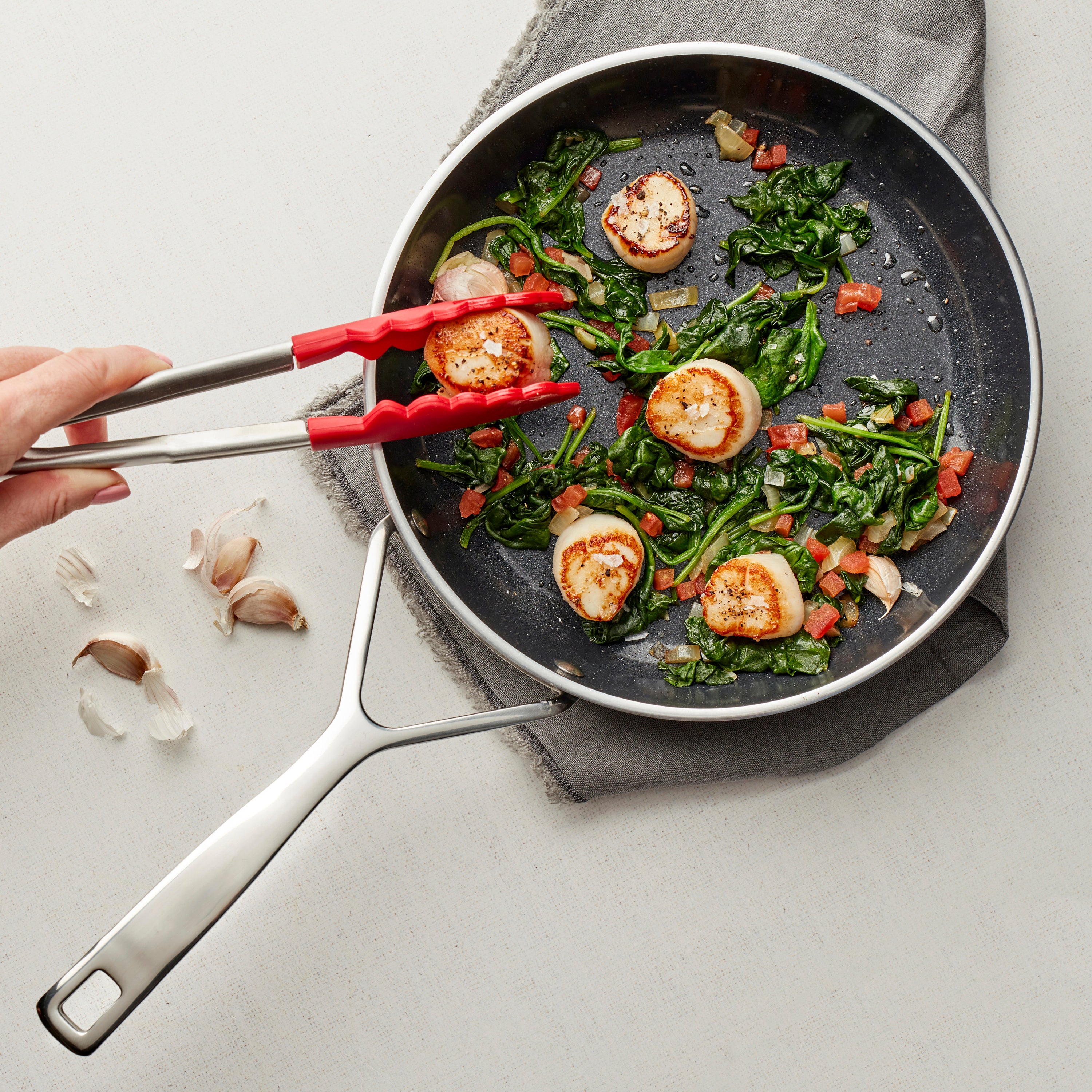 Induction-compatible ceramic nonstick skillet in a modern kitchen setting