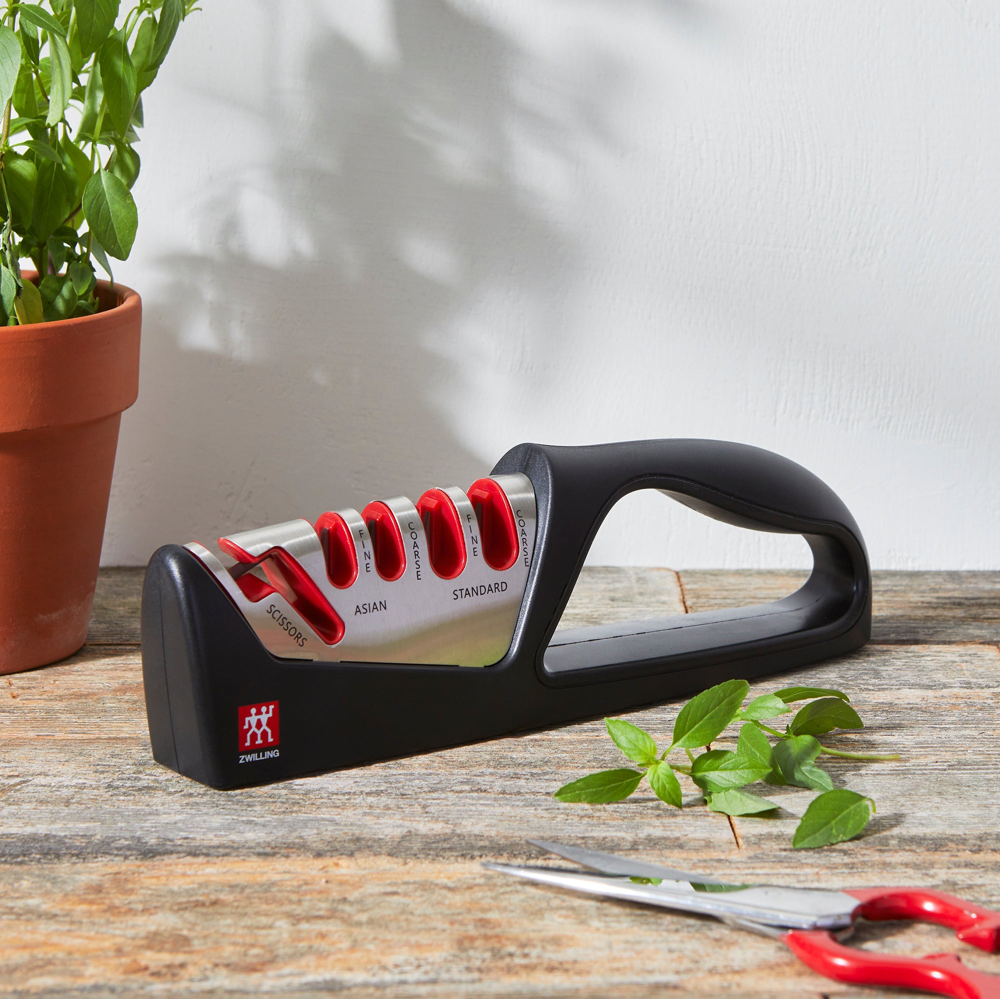 Using the kitchen sharpener to sharpen a Western chefs knife