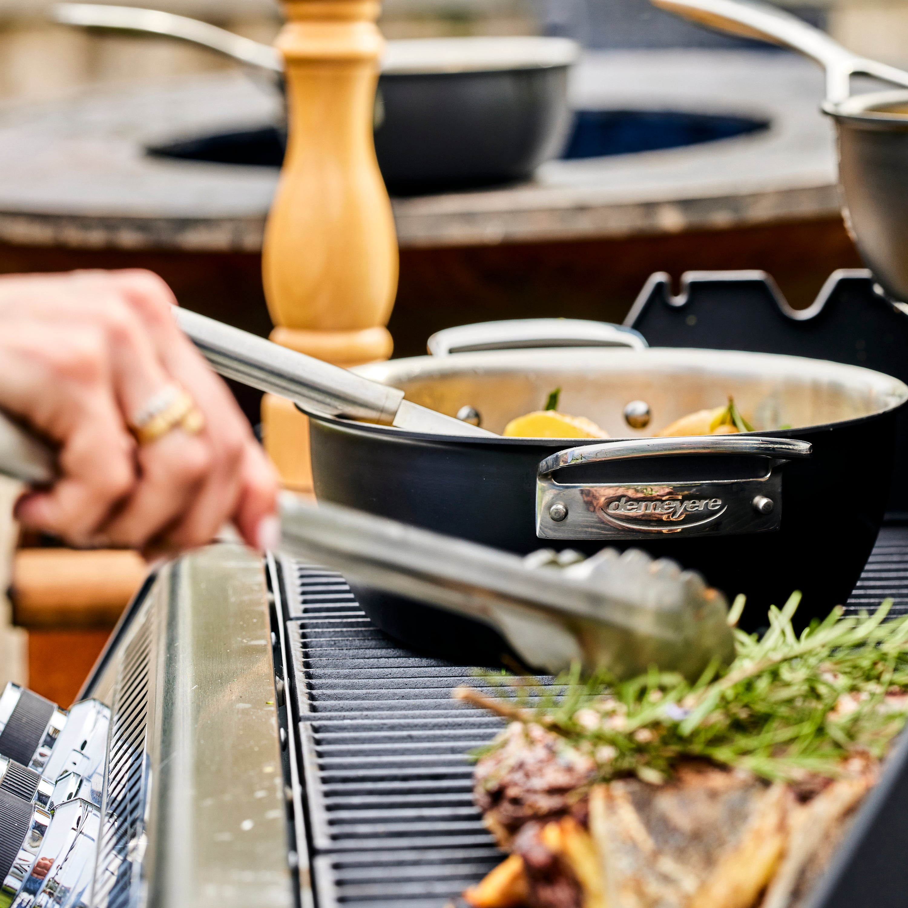 Side view of the Dutch oven with handles, demonstrating its durability and sleek design for outdoor and indoor use.