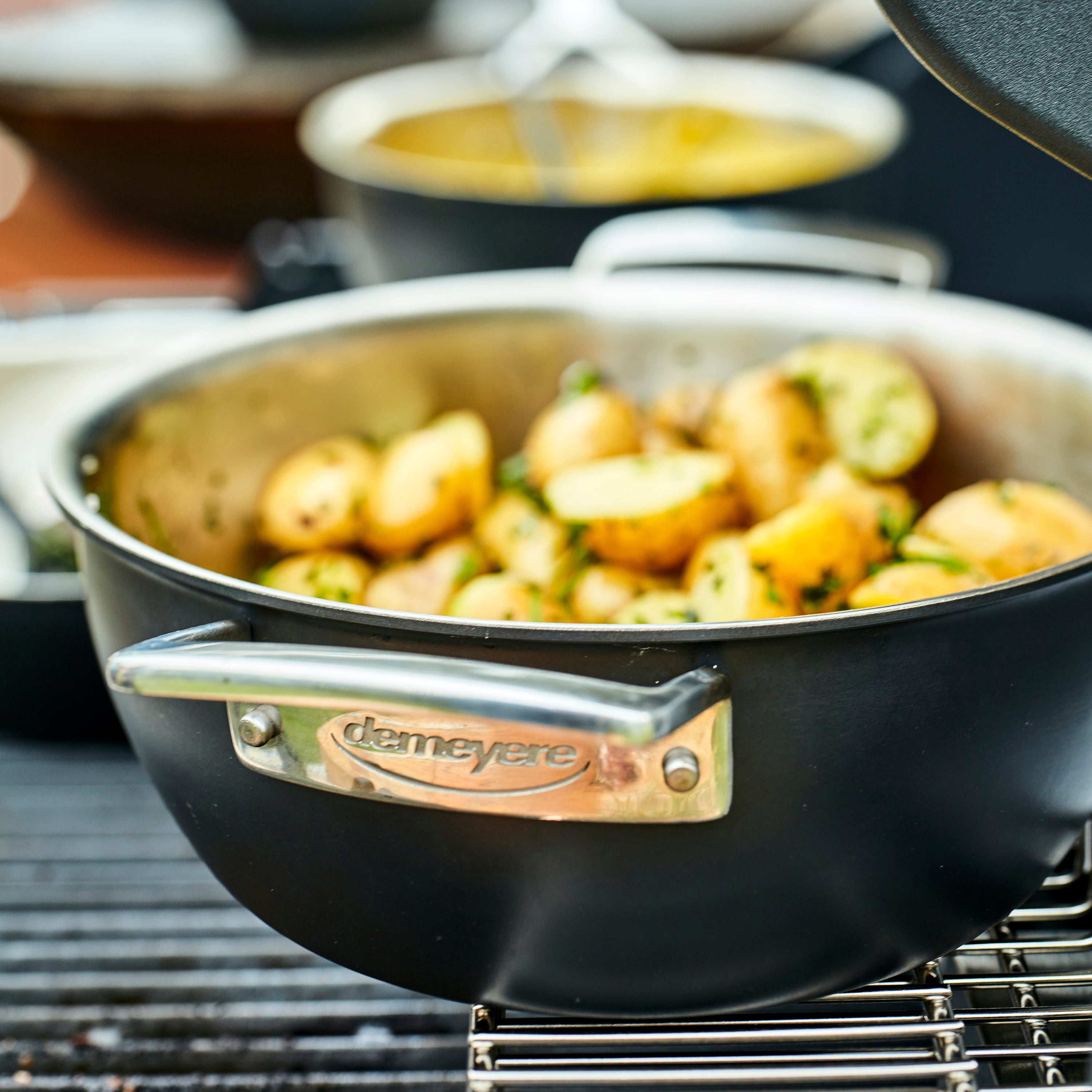 Side view of the Dutch oven with handles, demonstrating its durability and sleek design for outdoor and indoor use.