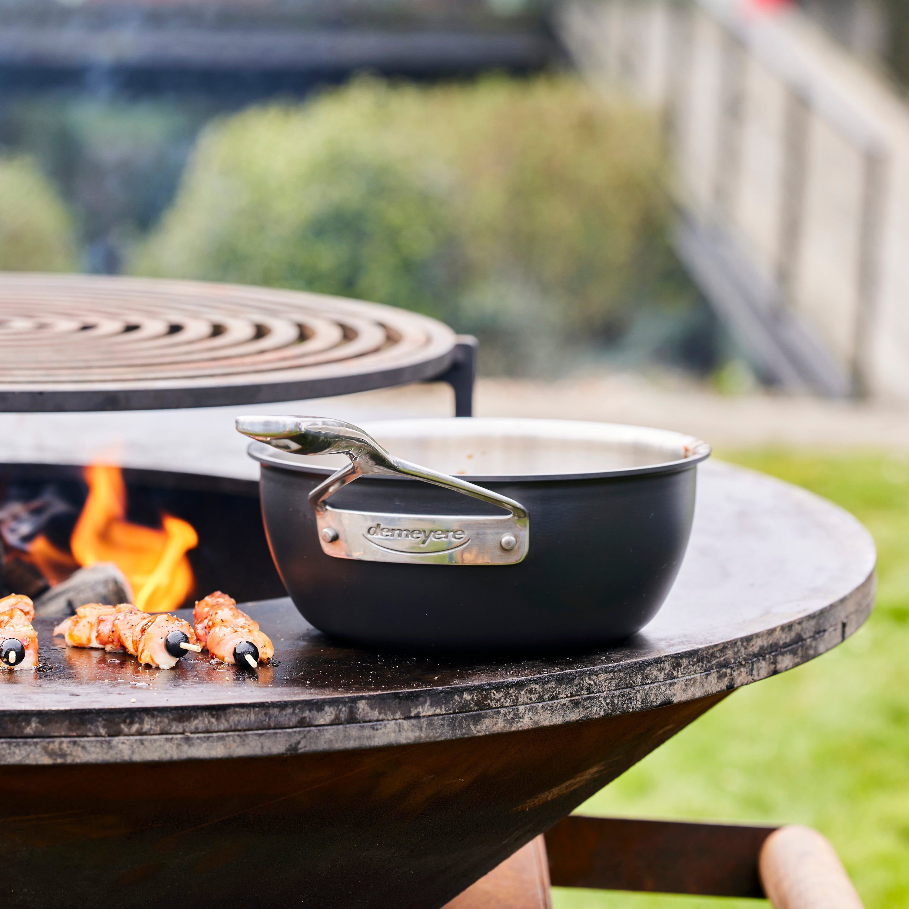 Premium 2-quart induction saucepan with lid showcasing its stainless steel design.