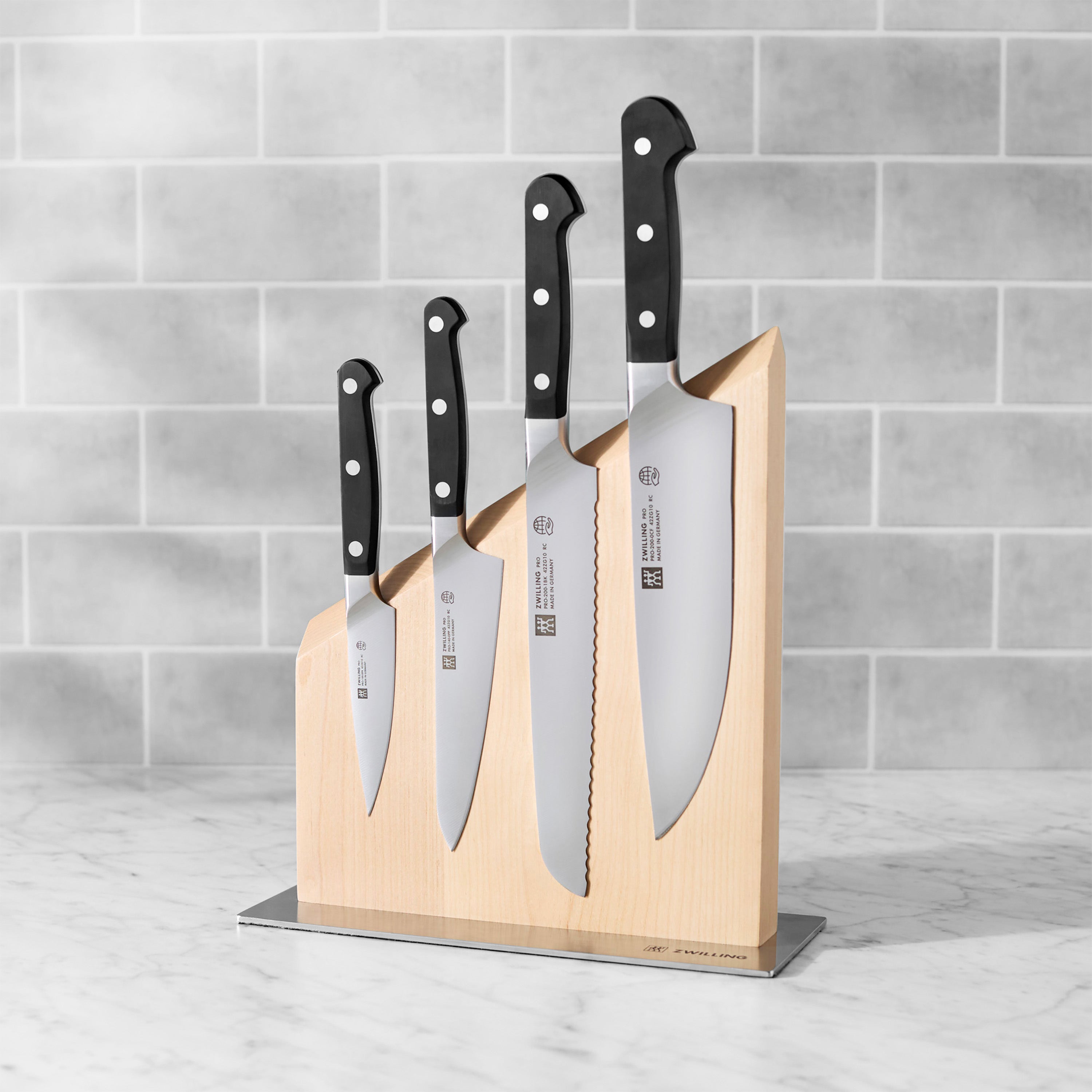 Front view of Zwilling Pro magnetic knife set showcasing sleek blades and handles