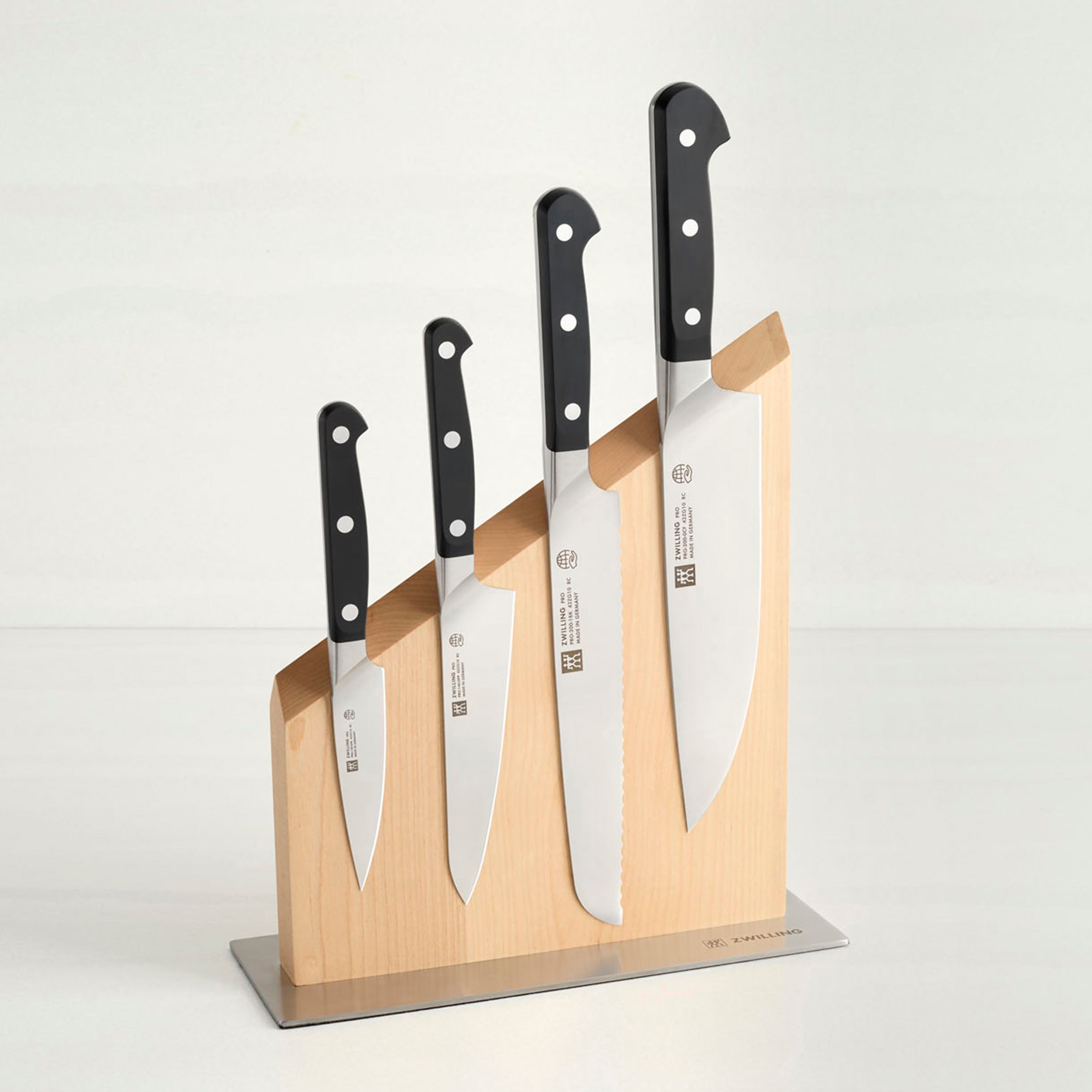 Close-up of the blade edge and bolster of Zwilling Pro kitchen knives