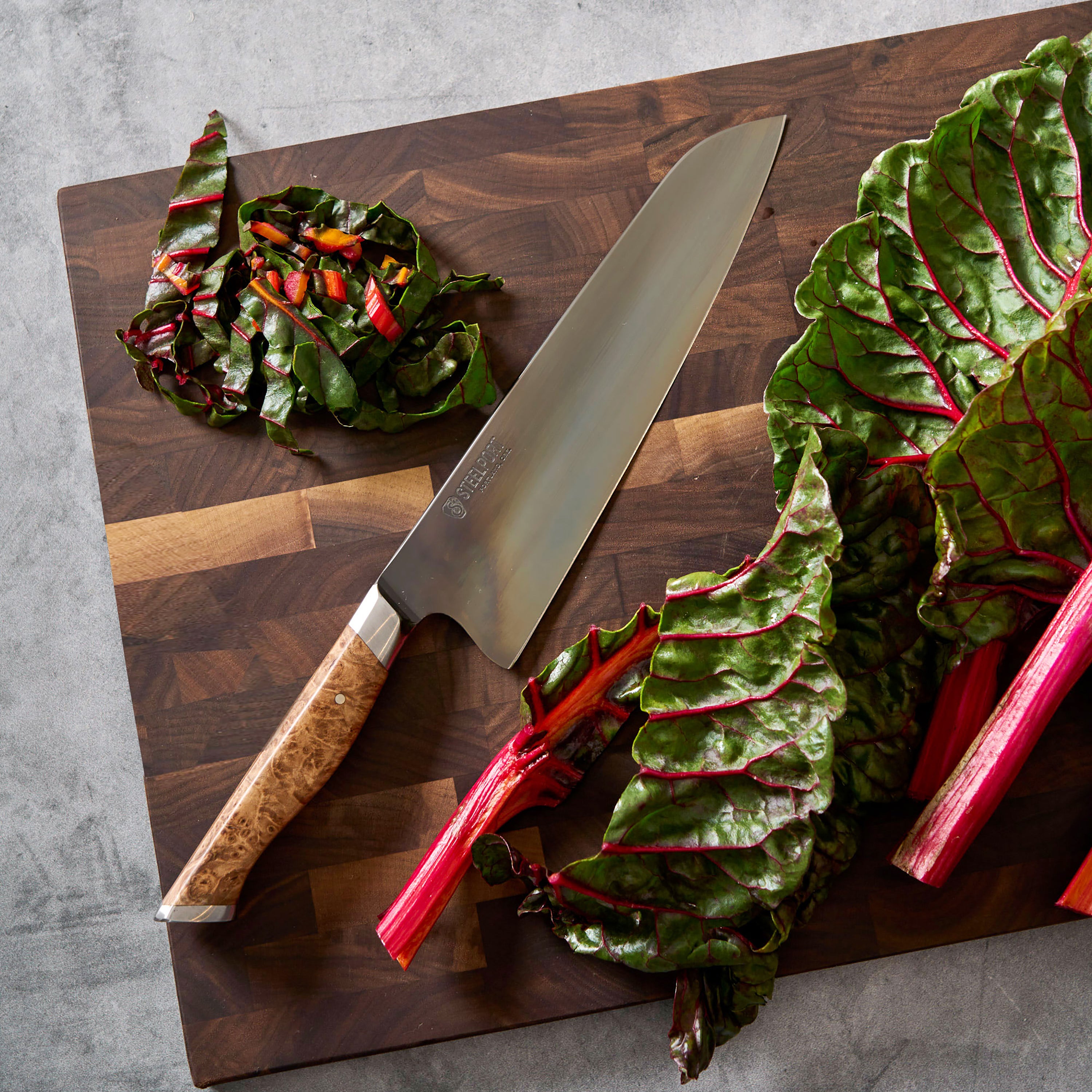 Top-down shot of the reversible surface with juice groove for prepping meats and ingredients