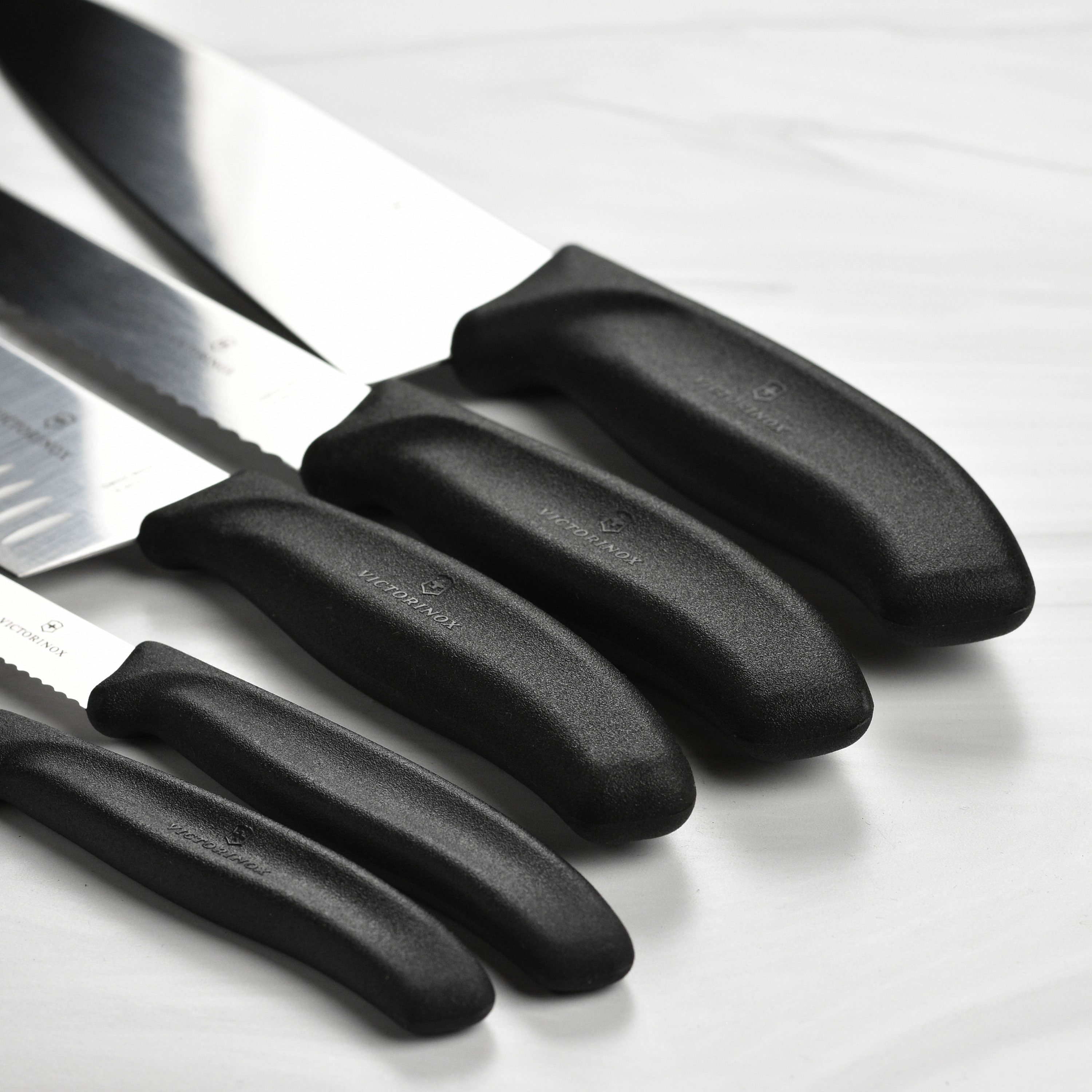 Close-up of high-carbon stainless steel chef knife with sharp blade