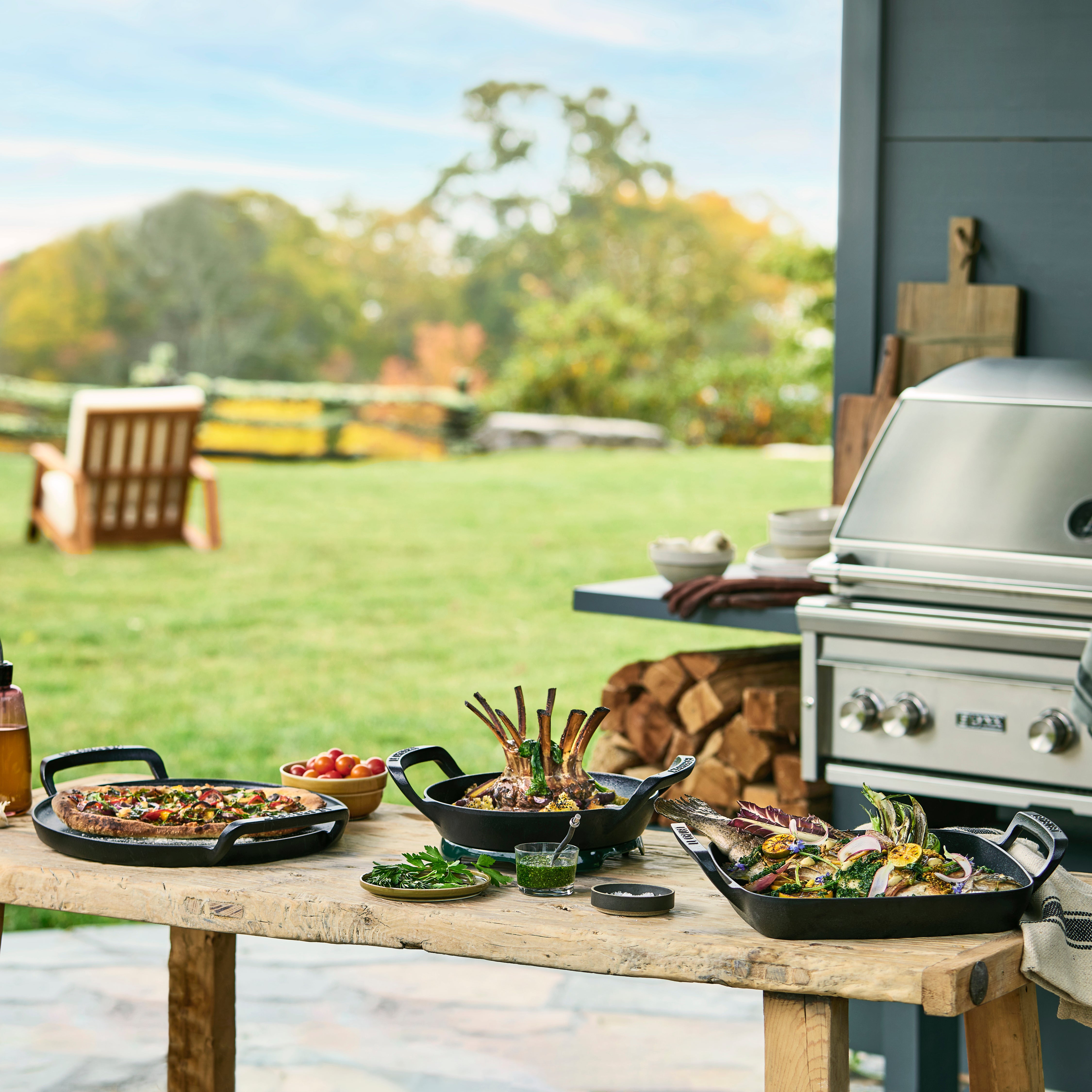 Side angle of Le Creuset grill basket with oversized handles
