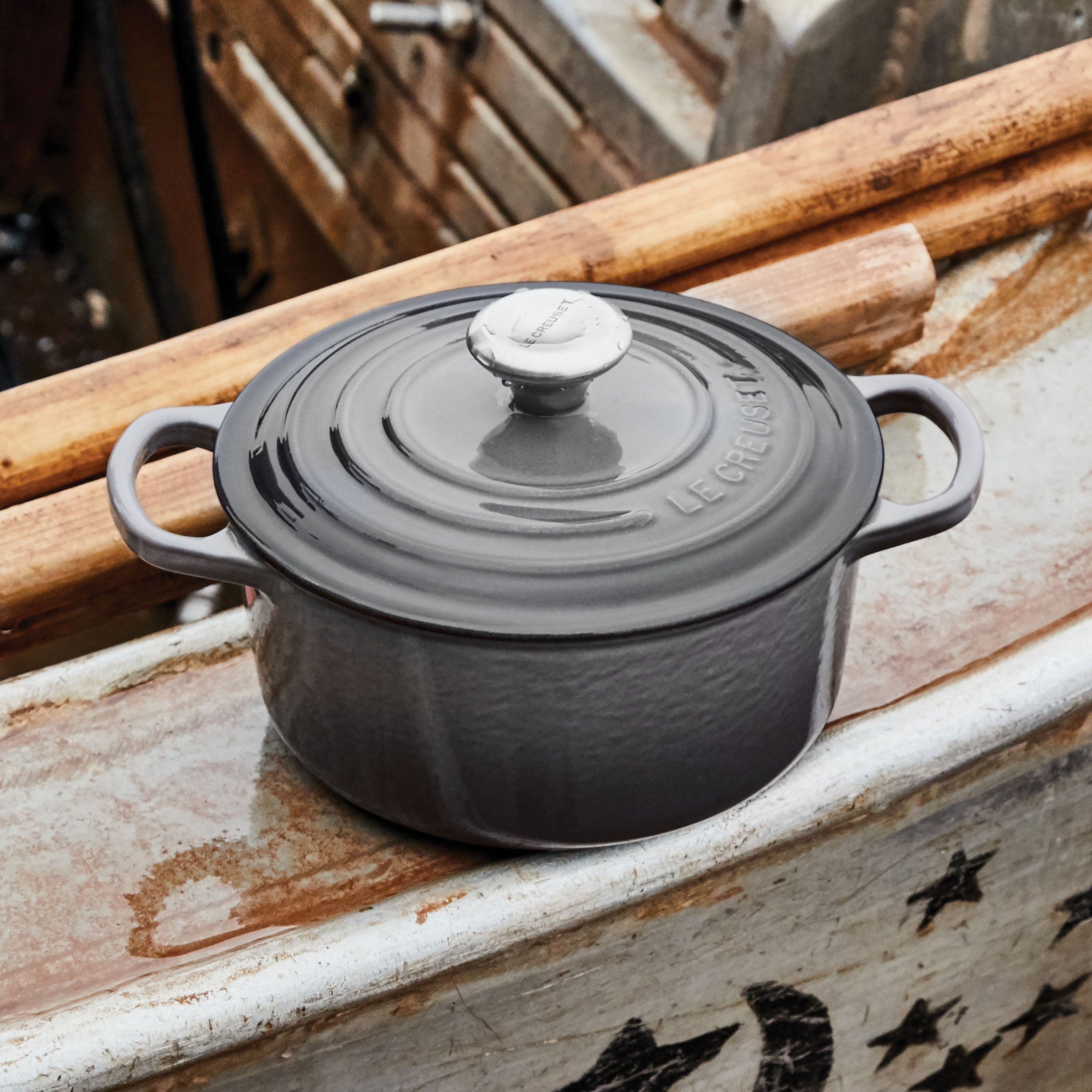Side angle of the dutch oven on a stovetop, ideal for slow cooking and bread baking