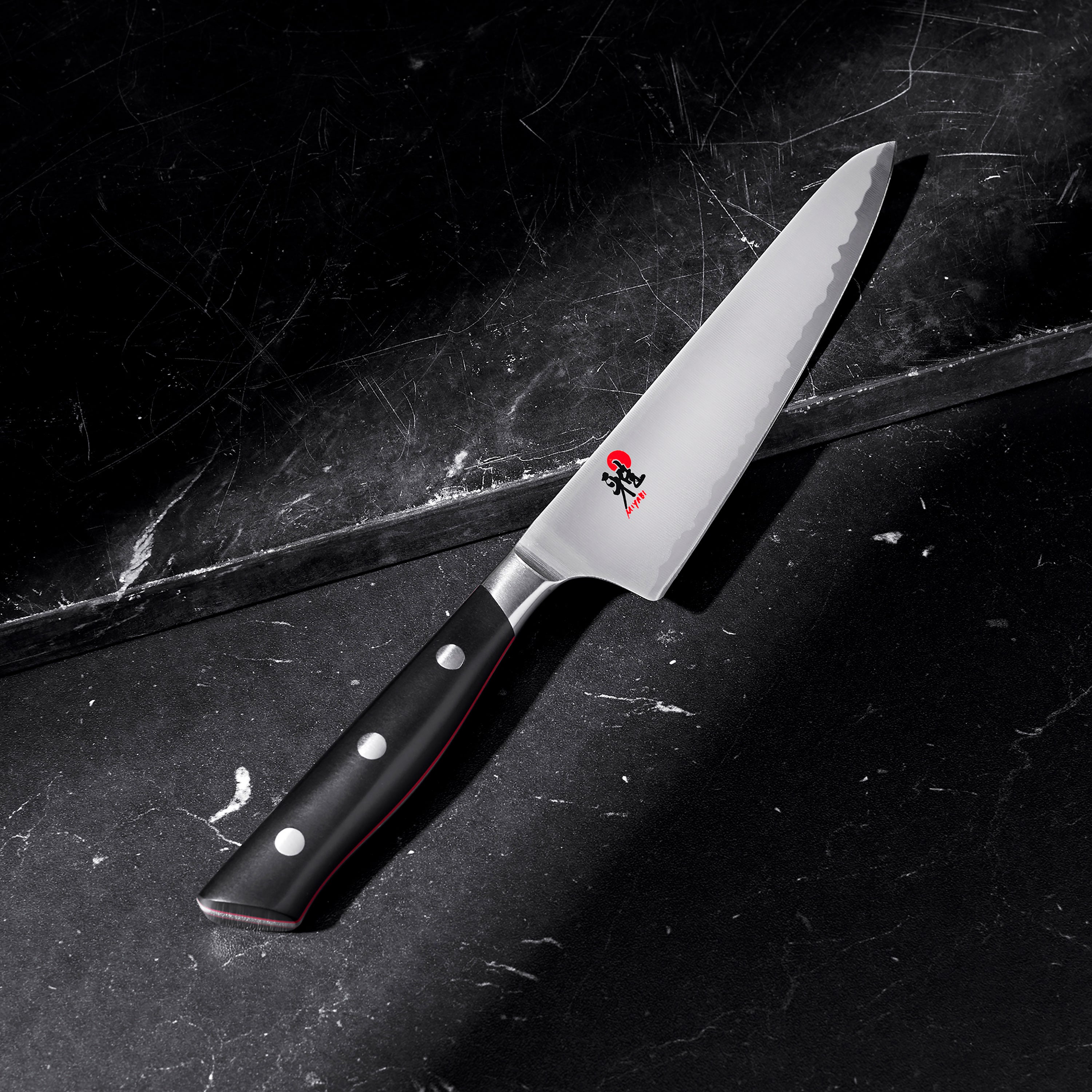 Close-up of blade angle and craftsmanship of Miyabi Evolution 5.5-inch chef knife