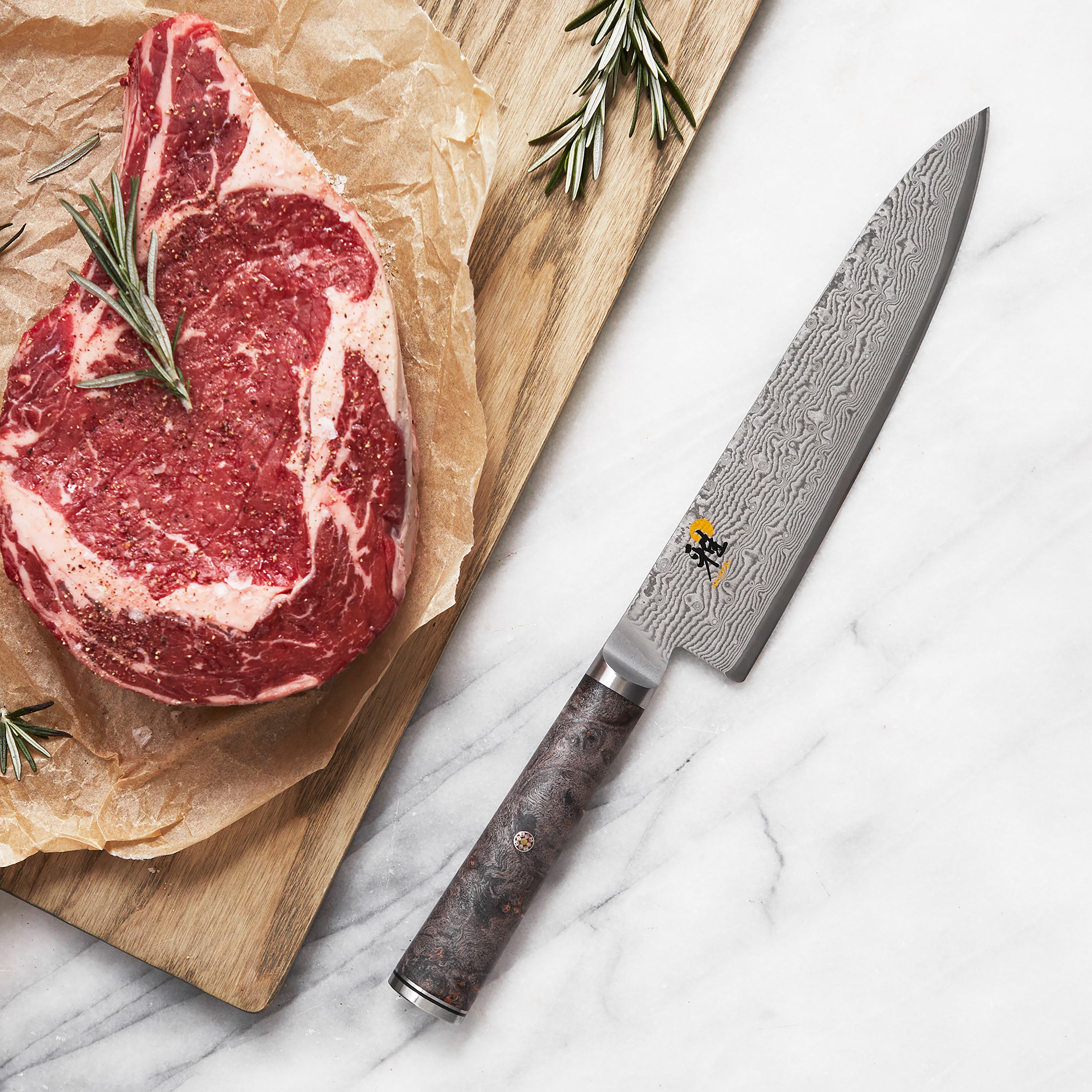 Close-up of the Miyabi Black knife blade highlighting its superior craftsmanship and sharp edge.