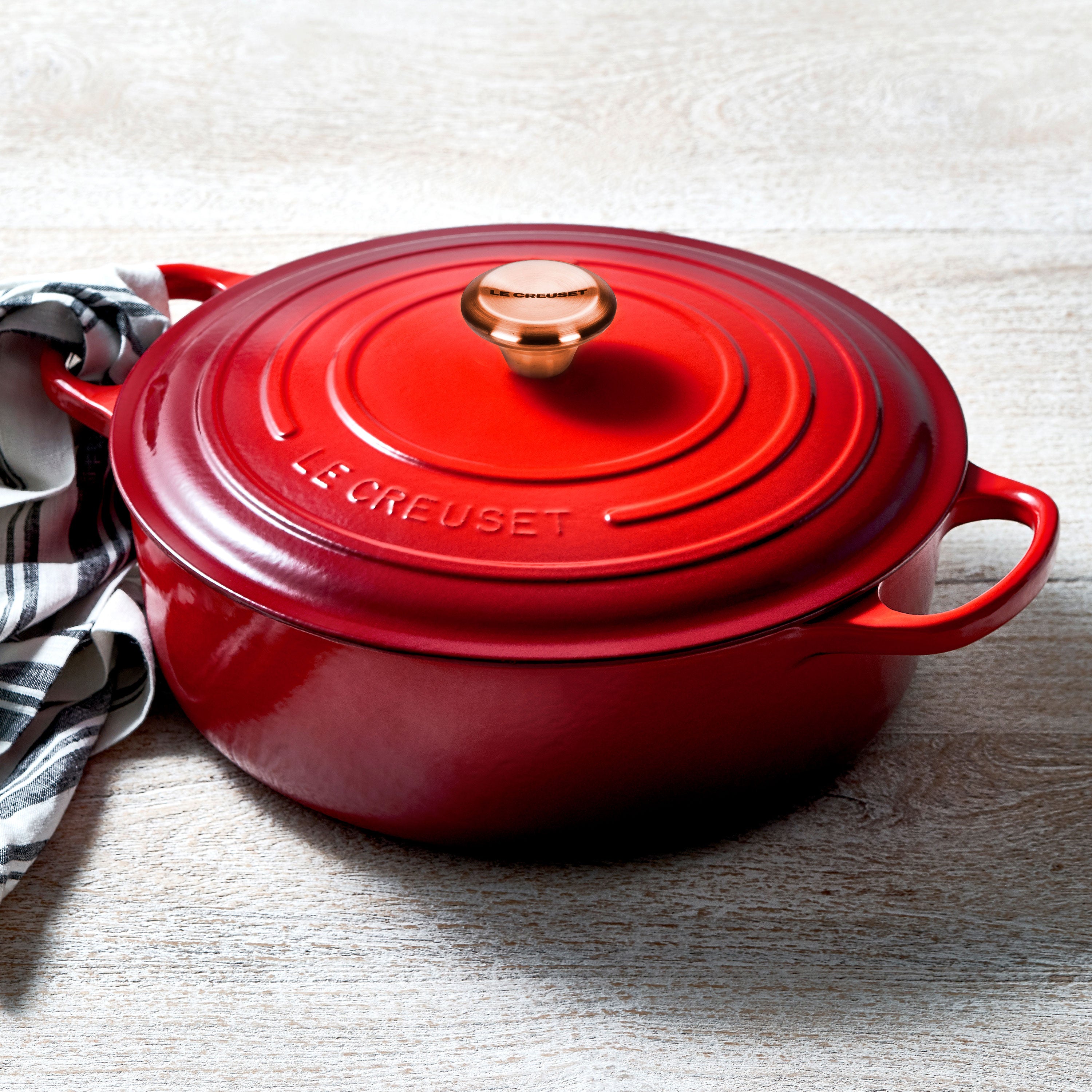 Dutch oven in use on a stovetop, steaming vegetables for a hearty meal