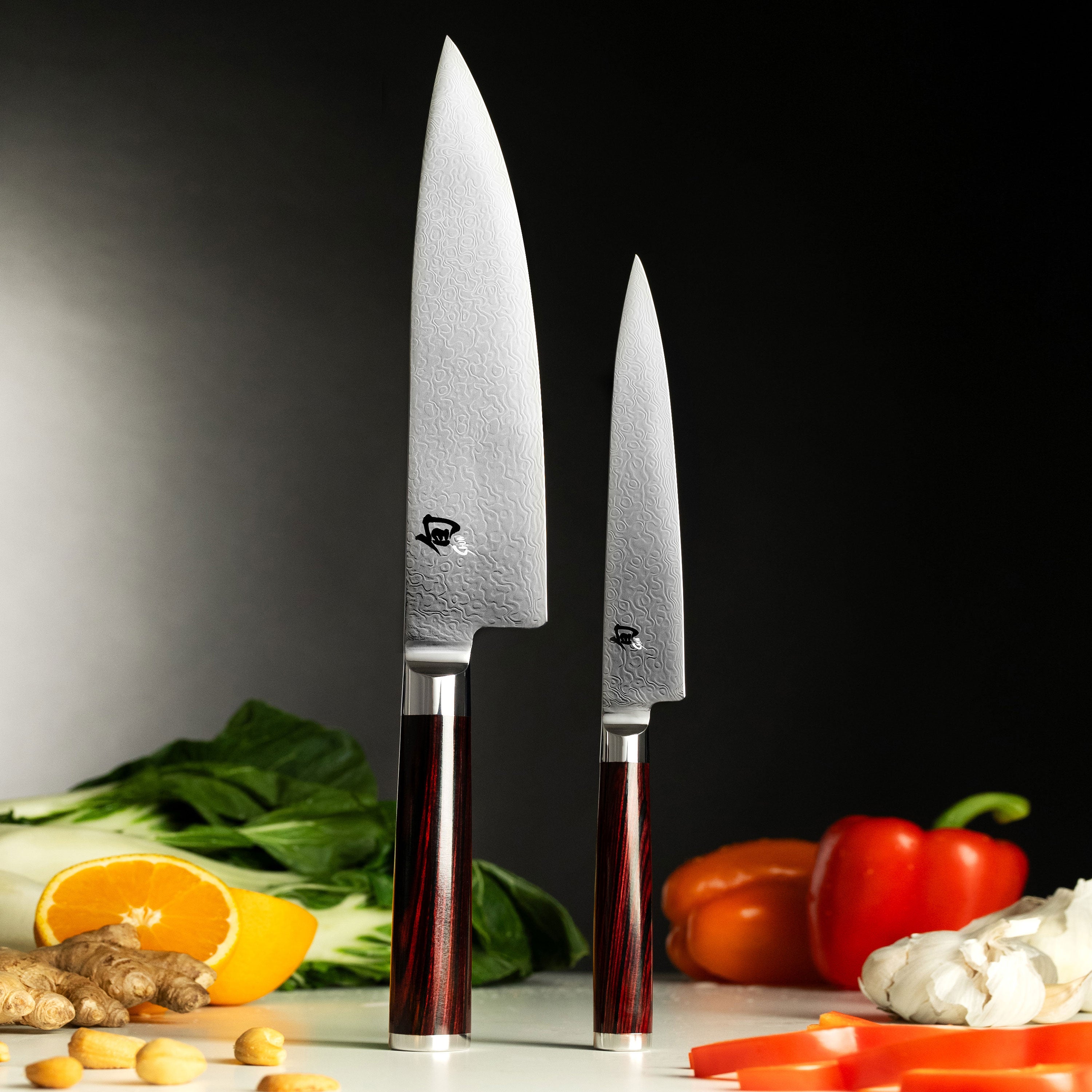 Chef preparing vegetables with Japanese knives from the Shun Kohen set