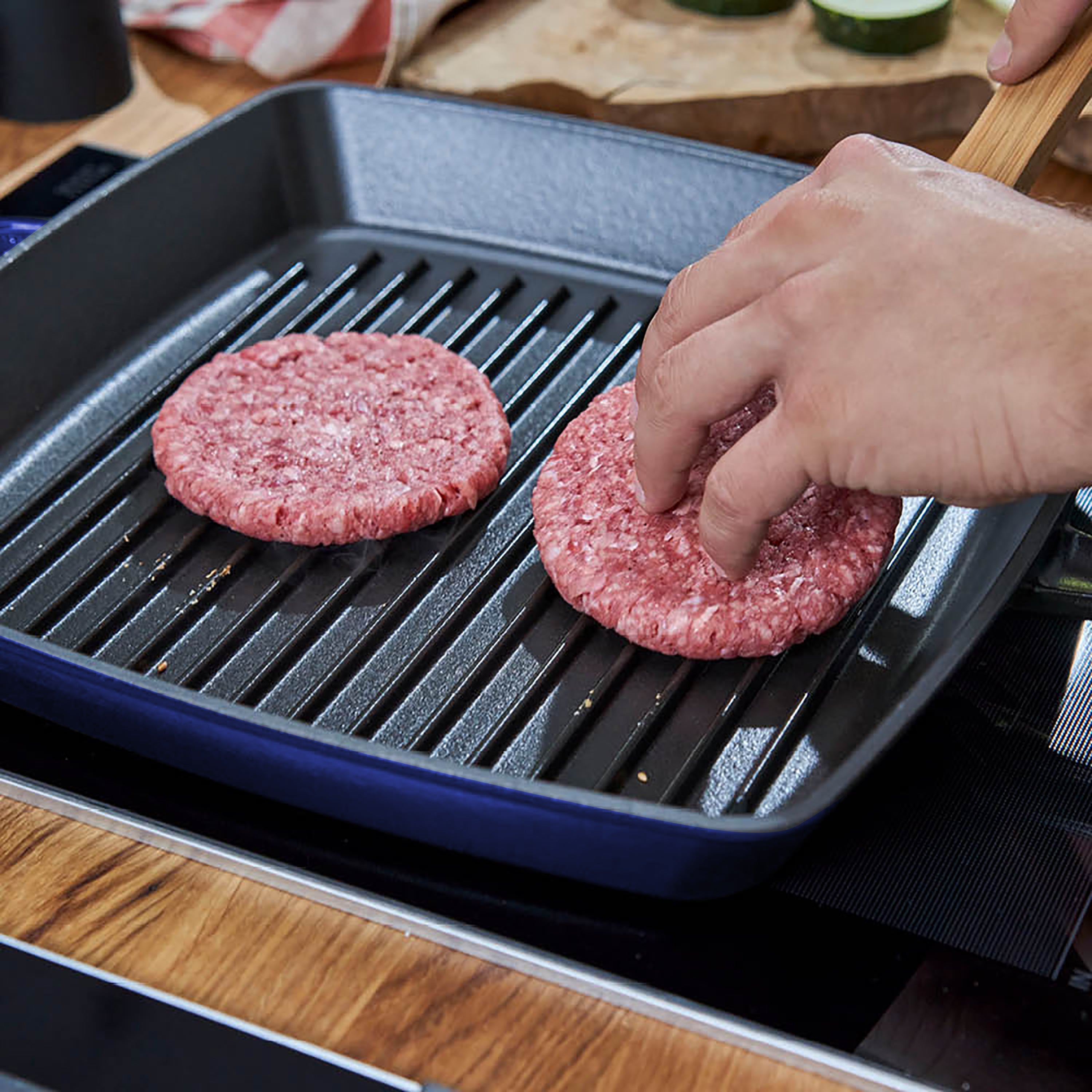 Close-up of BlueStone enameled cast iron square grill pan with grill marks
