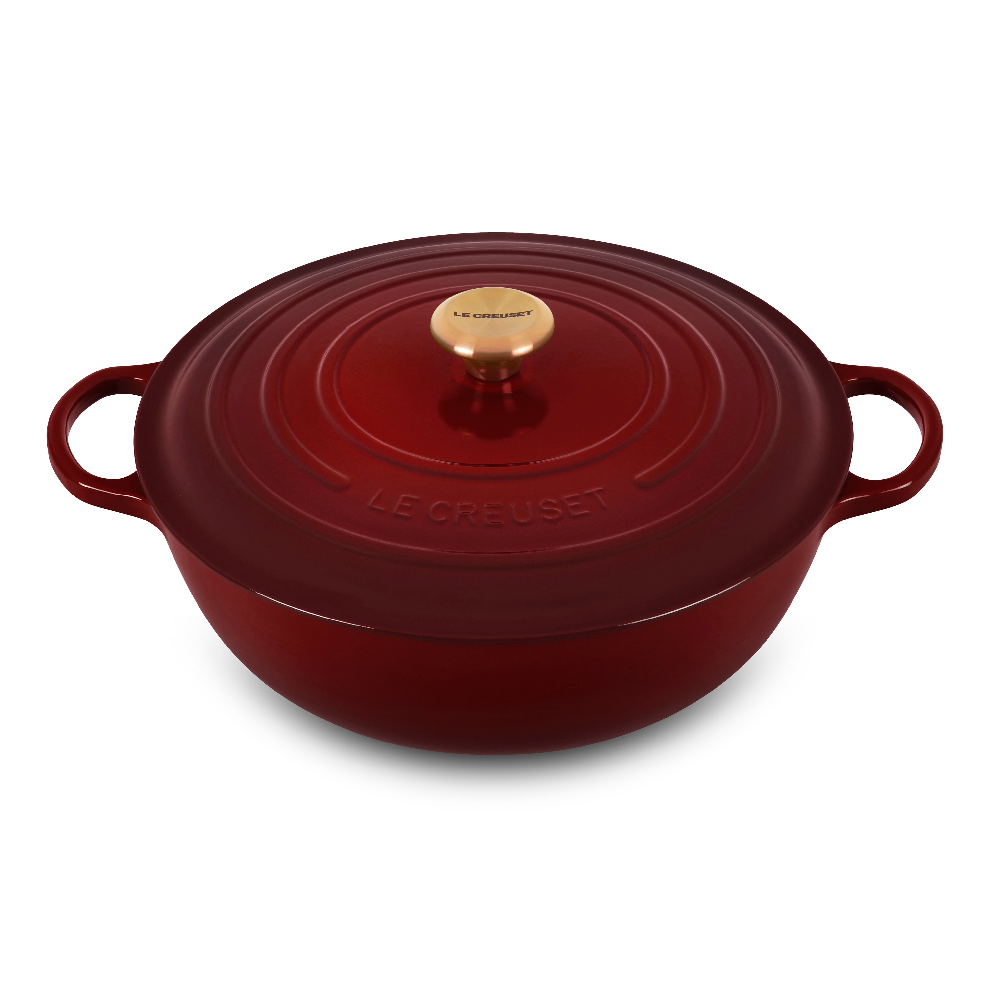 Le Creuset Rhone Chef's Dutch Oven with a vibrant finish, highlighting its ergonomic design and sturdy handles.