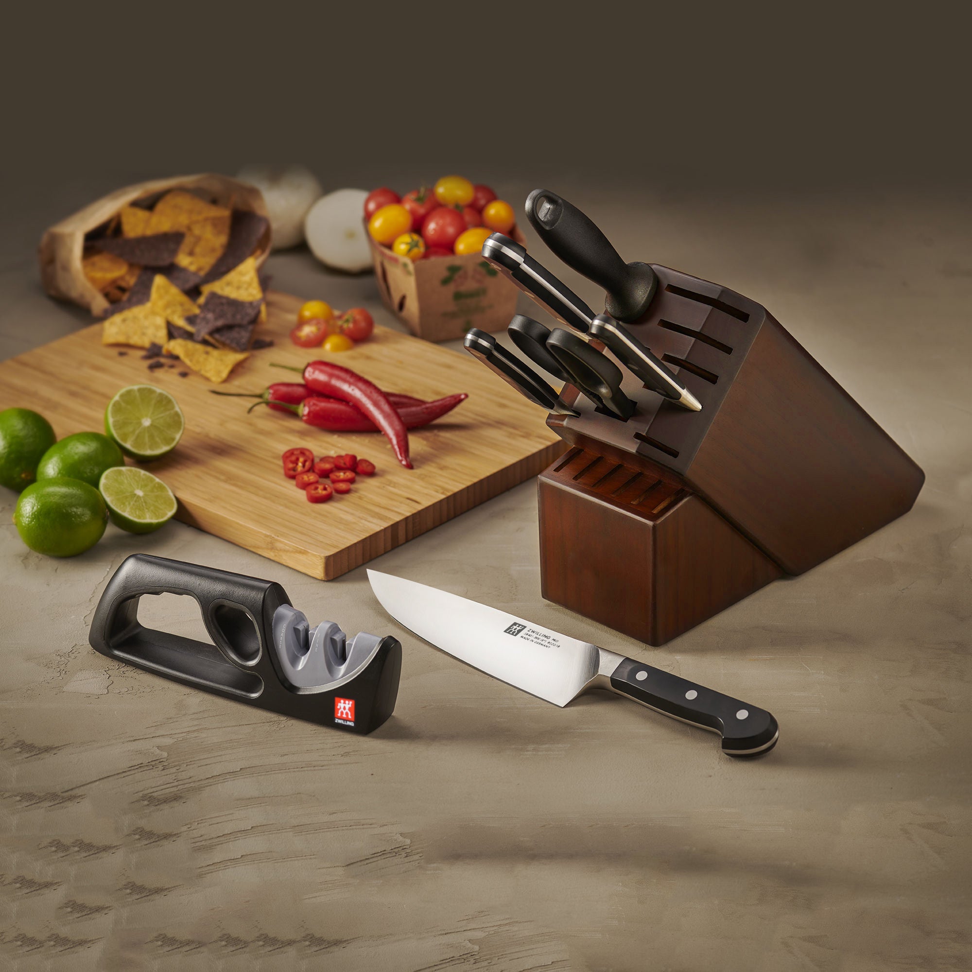 Close-up of Zwilling Pro Chef Knives in Acacia Knife Block Set highlighting the sharp blades.