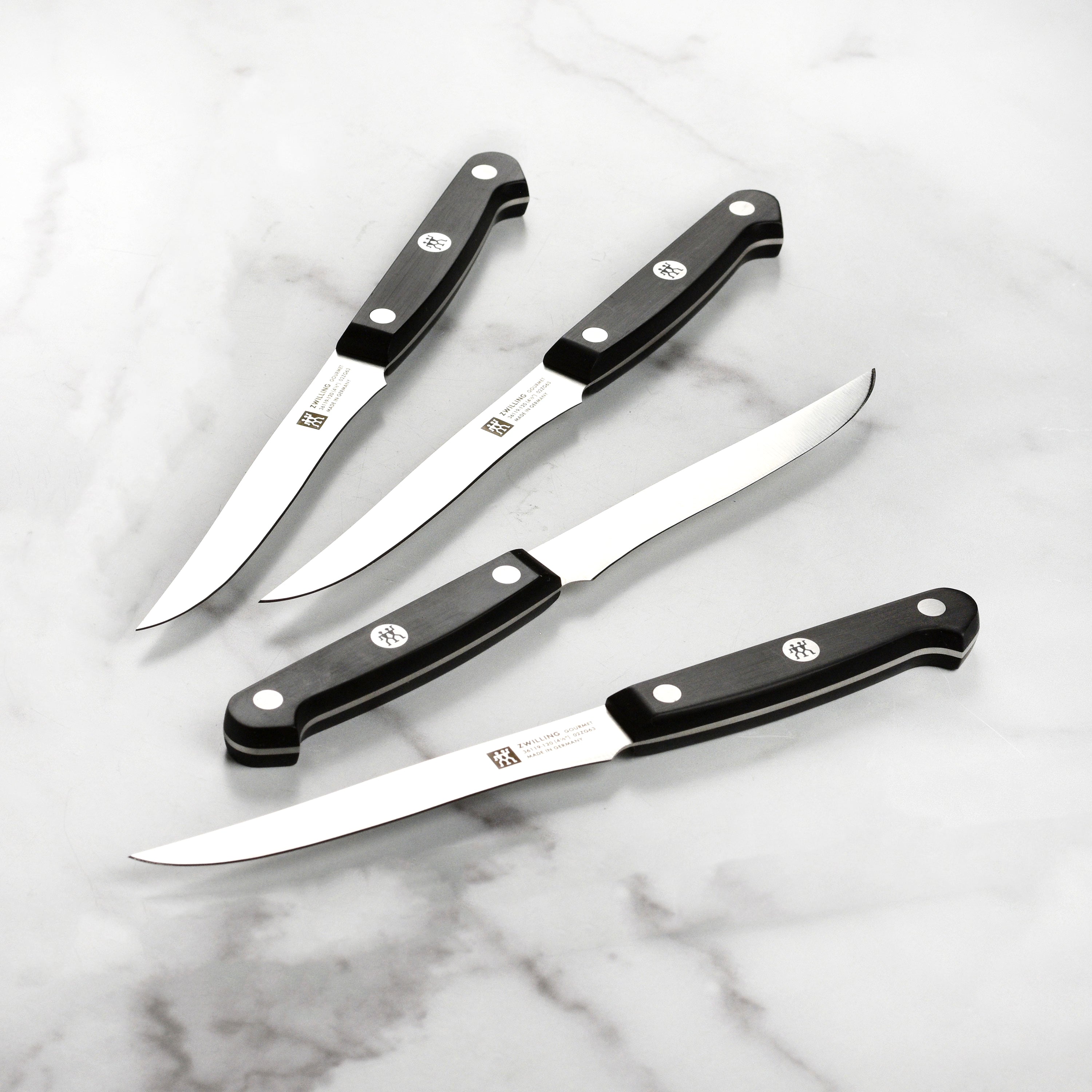 The Zwilling knife block set displayed in a modern kitchen setting, emphasizing its aesthetic appeal and functionality.
