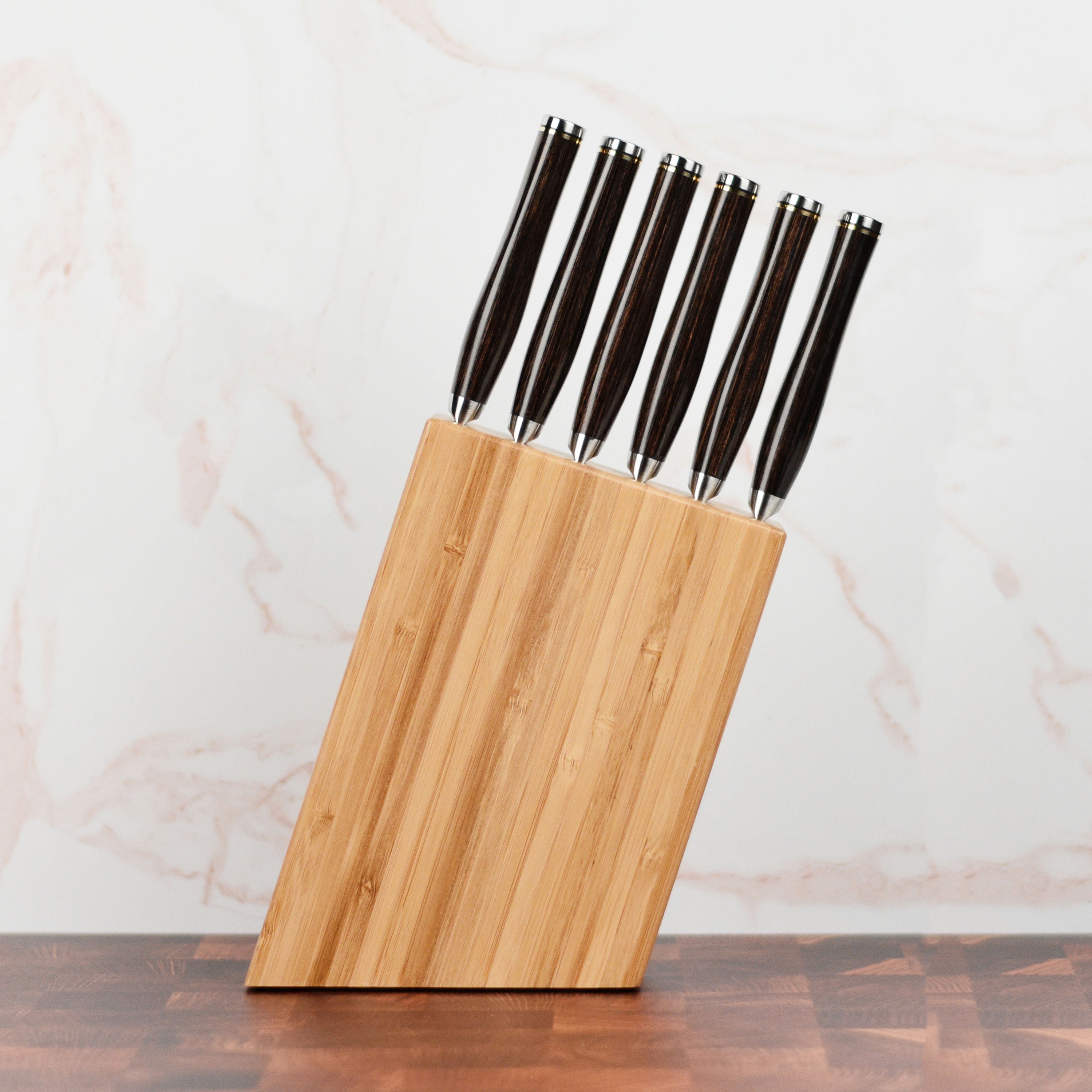 Seki Master Premium Steak Knife Set arranged on a dining table, ready for use.
