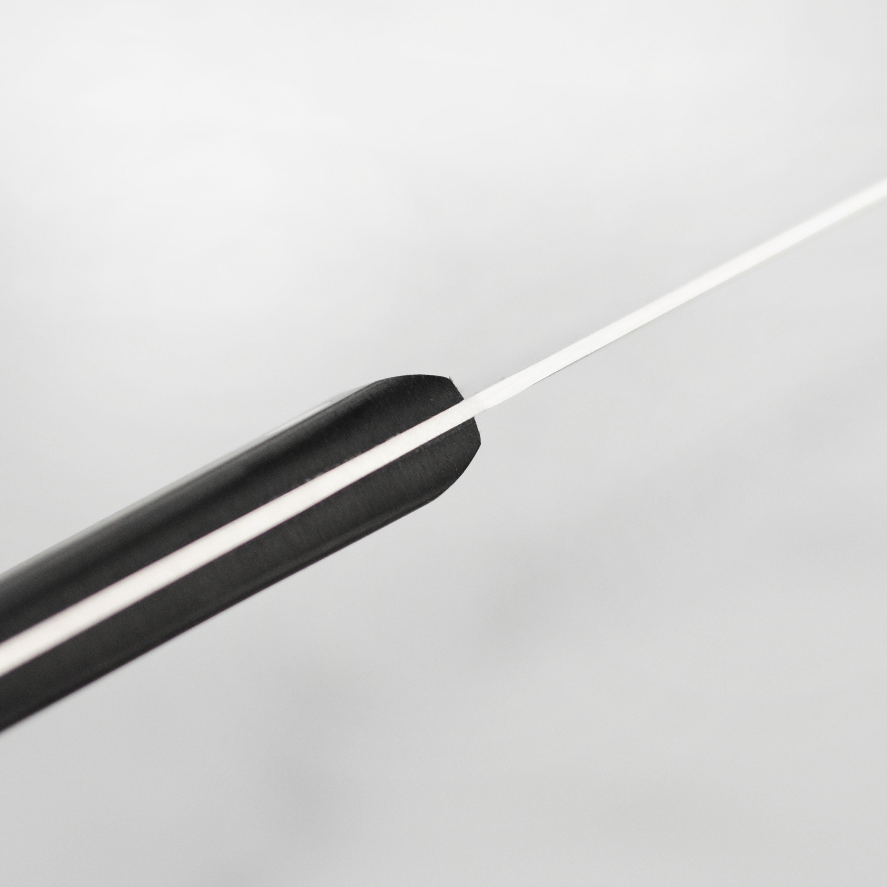 Detailed view of the Zwilling knives, highlighting the precision-honed blades and comfortable handle.