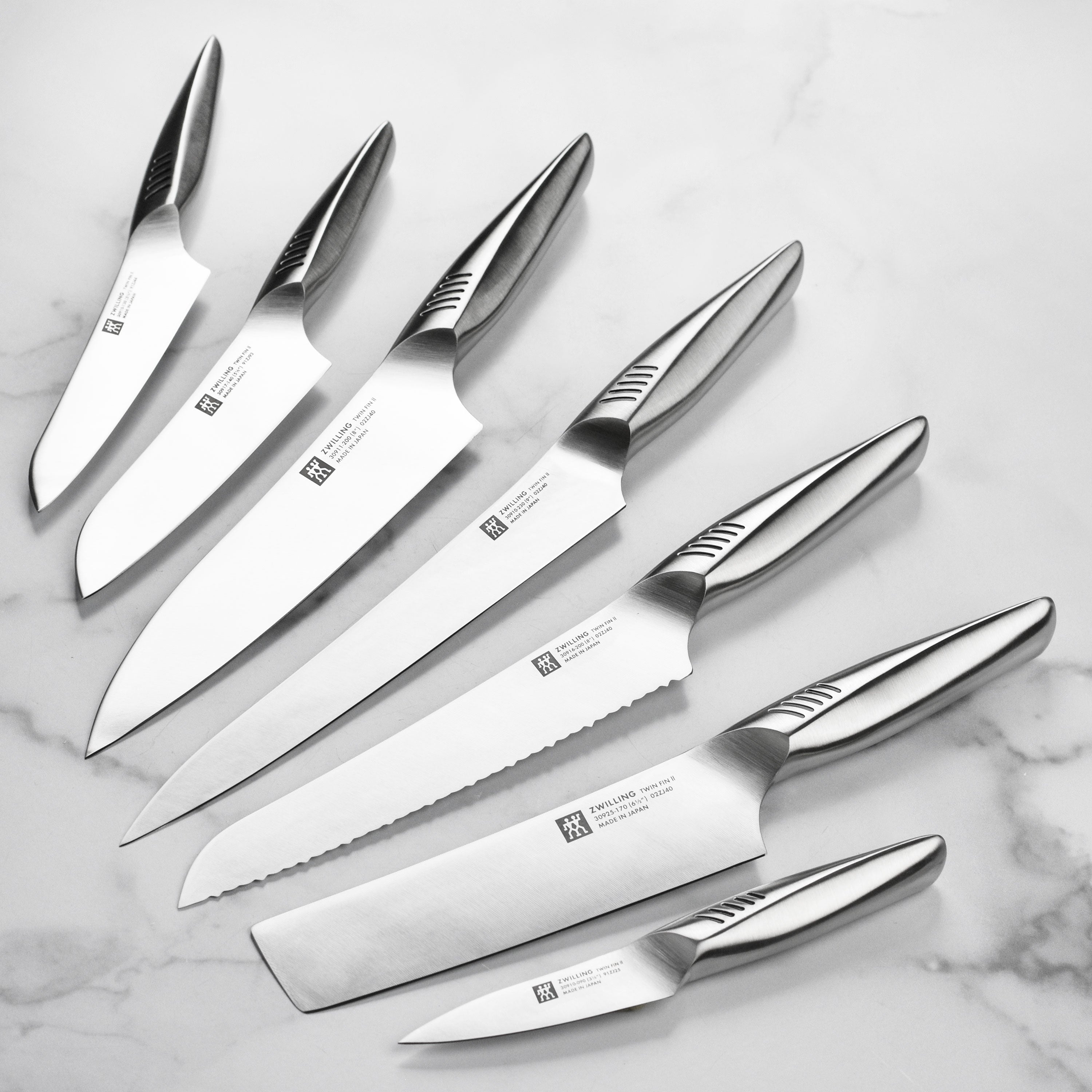 Close-up of the forged blade and hollow handle from the Zwilling Twin Fin II bamboo knife set