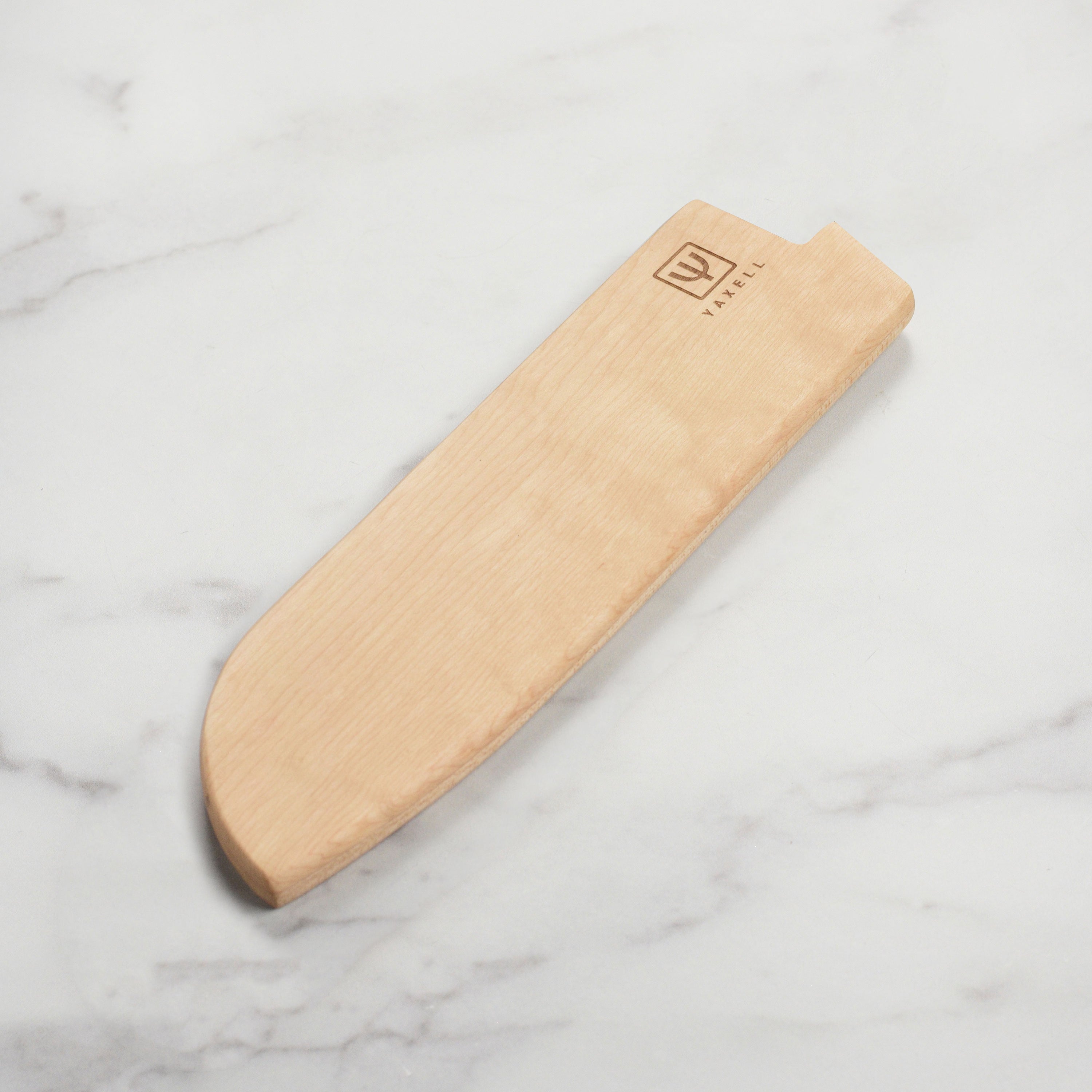 Premium magnetic knife sheath for 8-inch Kiritsuke knife, displayed on a wooden countertop.
