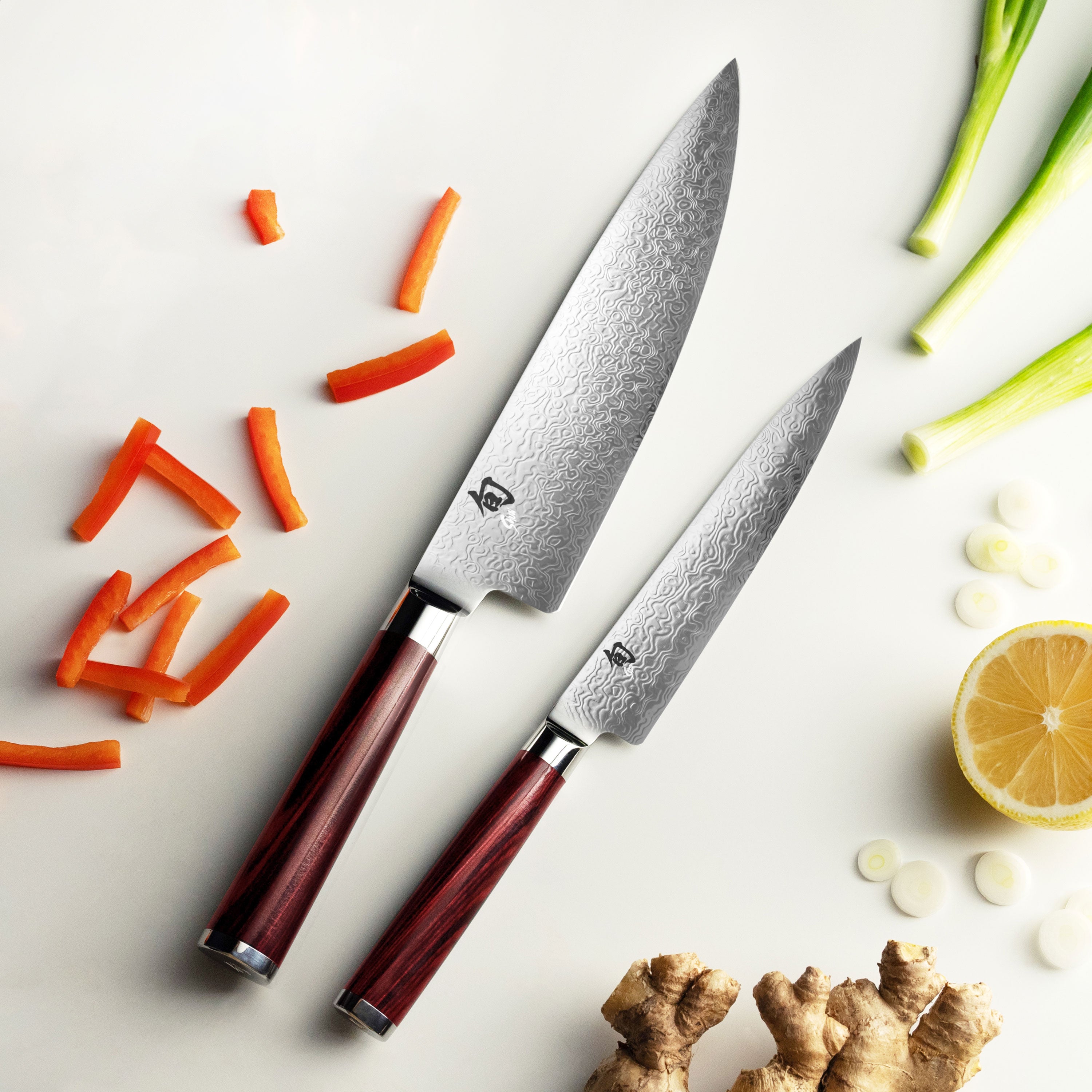 Chef preparing vegetables with Japanese knives from the Shun Kohen set
