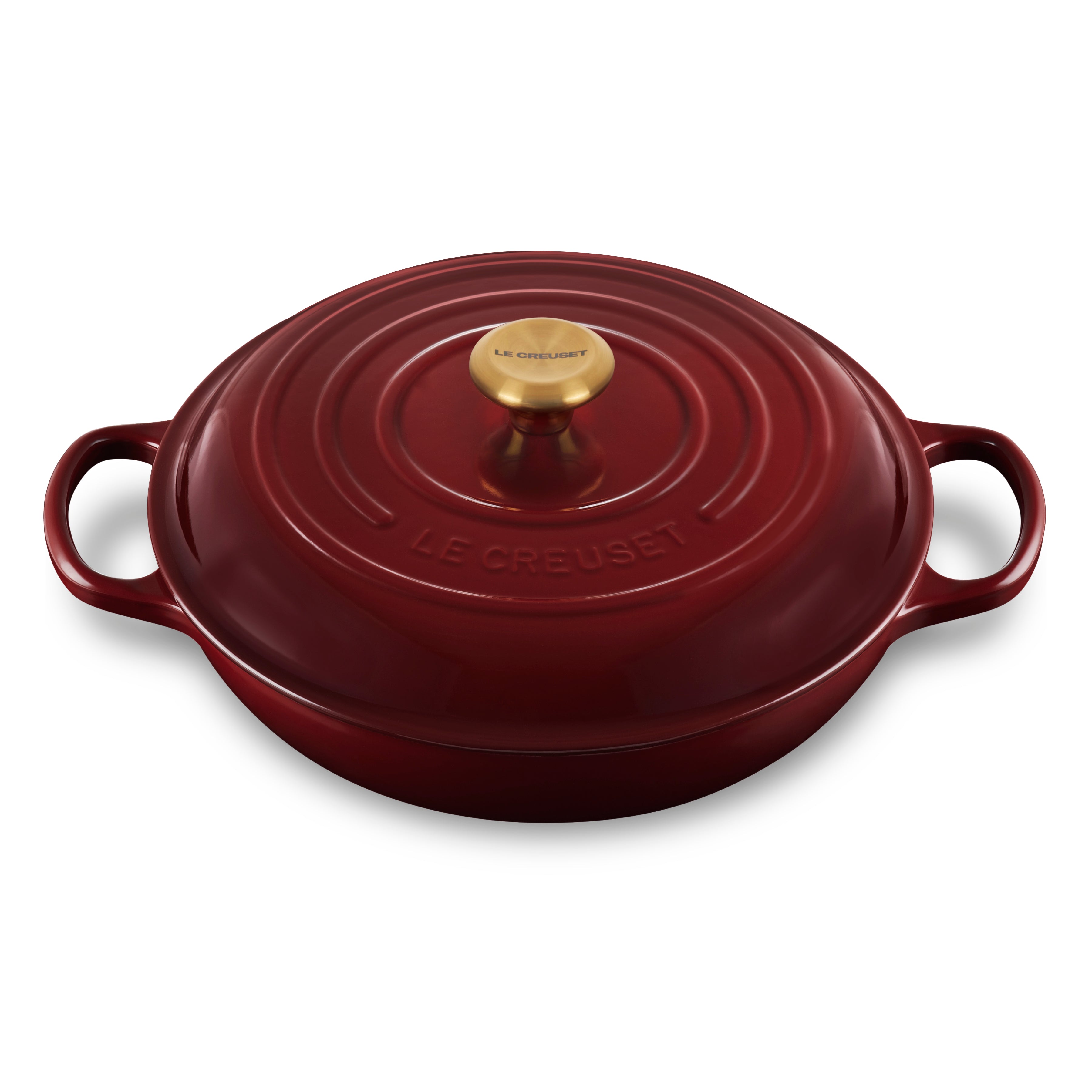 Le Creuset 5-quart braiser showcasing its gold stainless steel knob and ergonomic handles, perfect for slow cooking.
