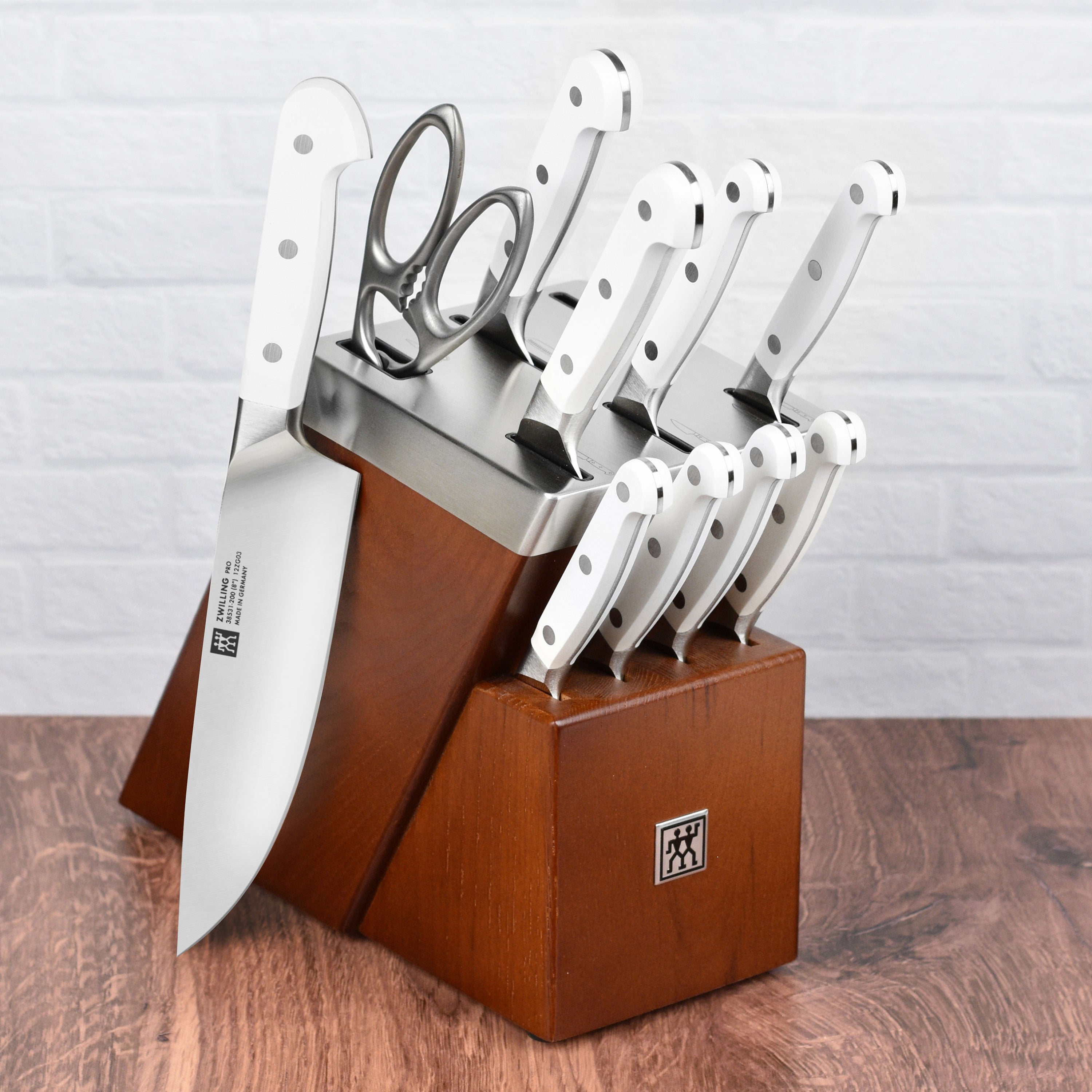 Premium stainless steel kitchen shears with bottle opener, showcasing the sharp blades and ergonomic handle.