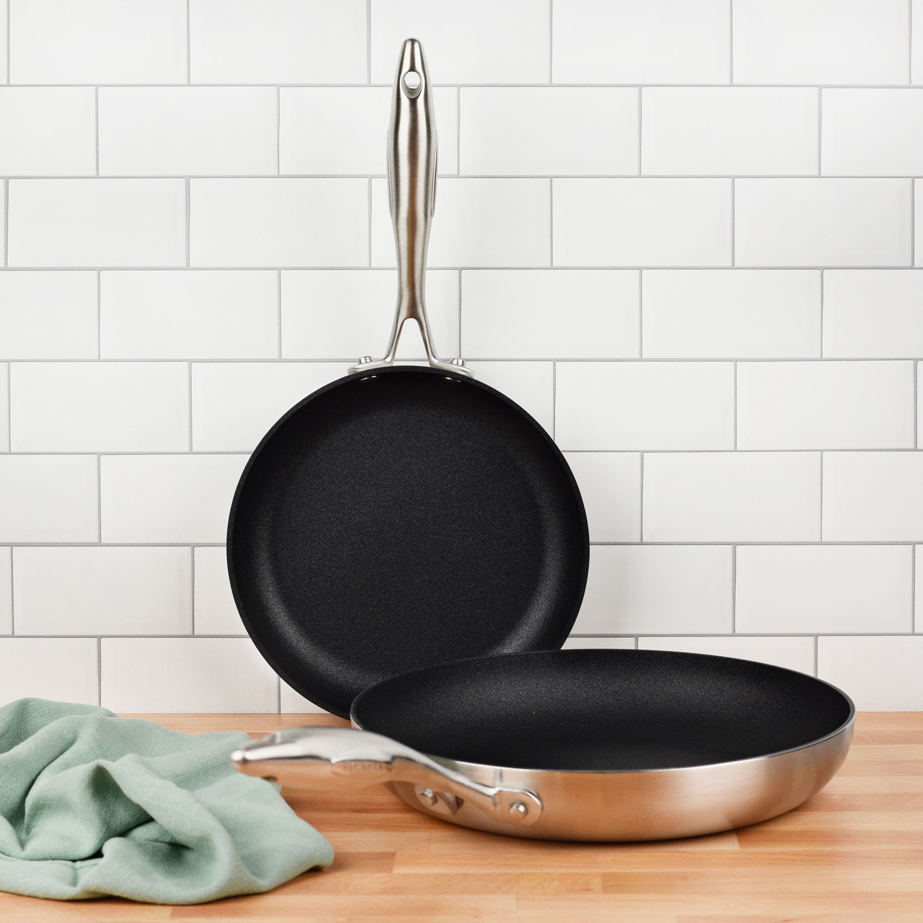 Cookware set in use, showing even heat distribution and nonstick surface