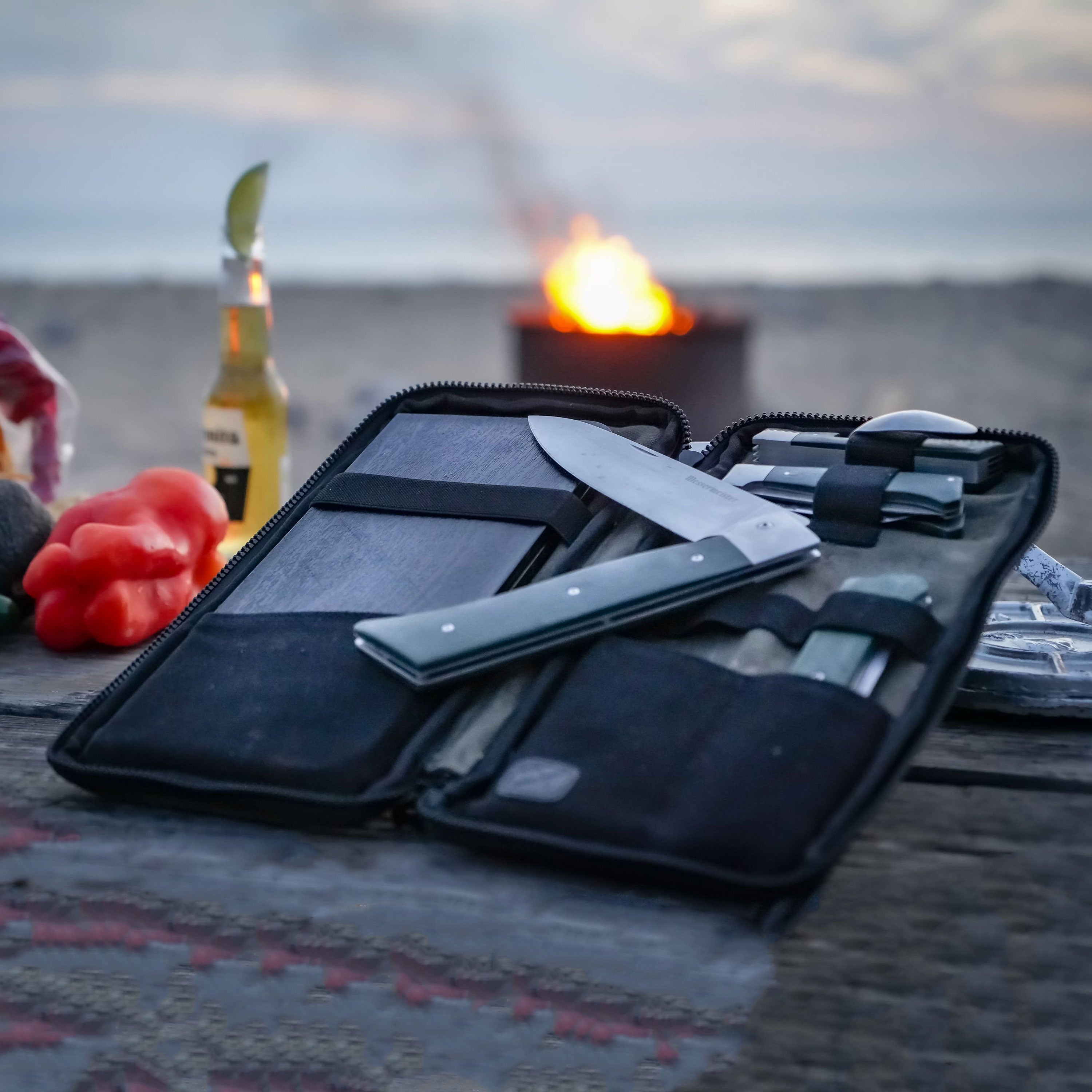 Outdoor use of portable cutlery set for outdoor cooking during a backcountry meal prep.