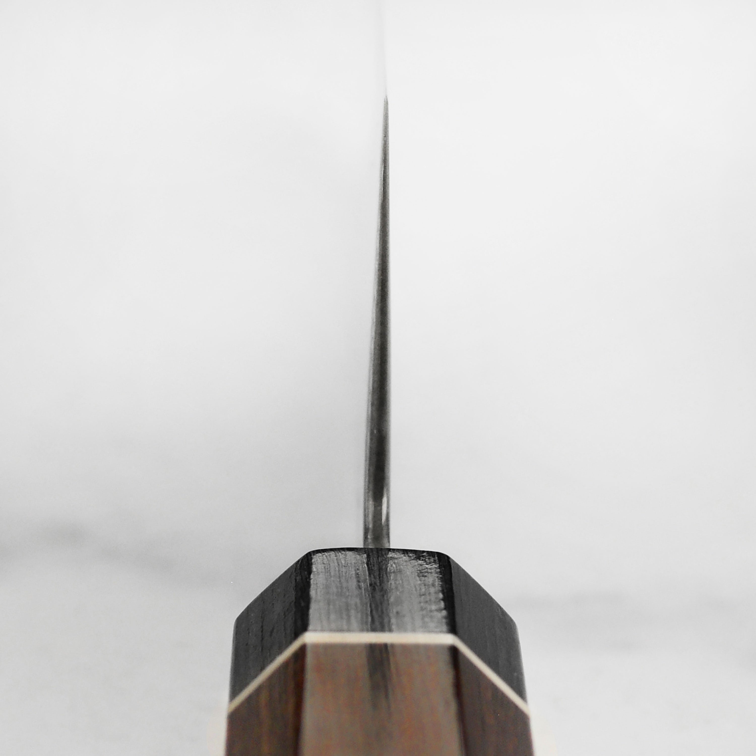 Front view of Senzo Black Damascus 8-inch Kiritsuke Knife with detailed blade pattern
