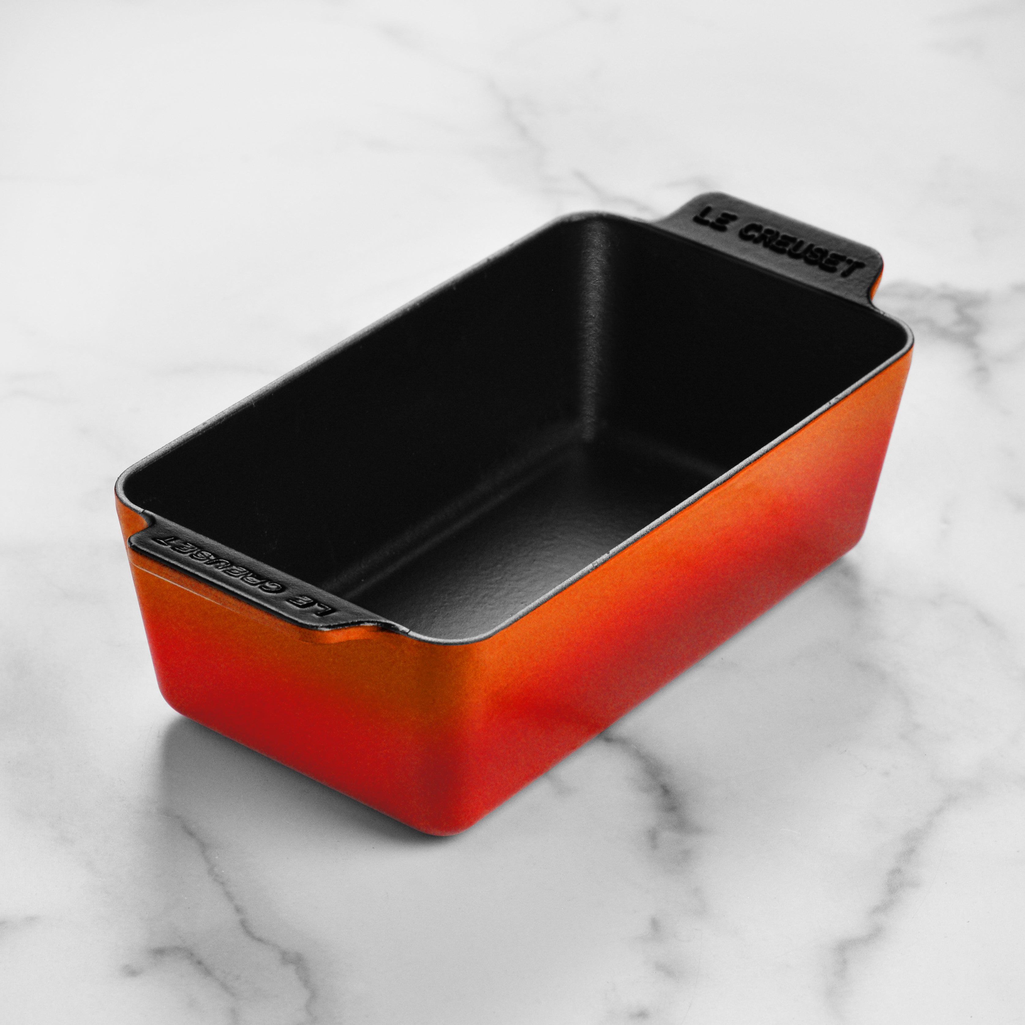 A top view of the Le Creuset loaf pan being used to bake a delicious homemade bread.