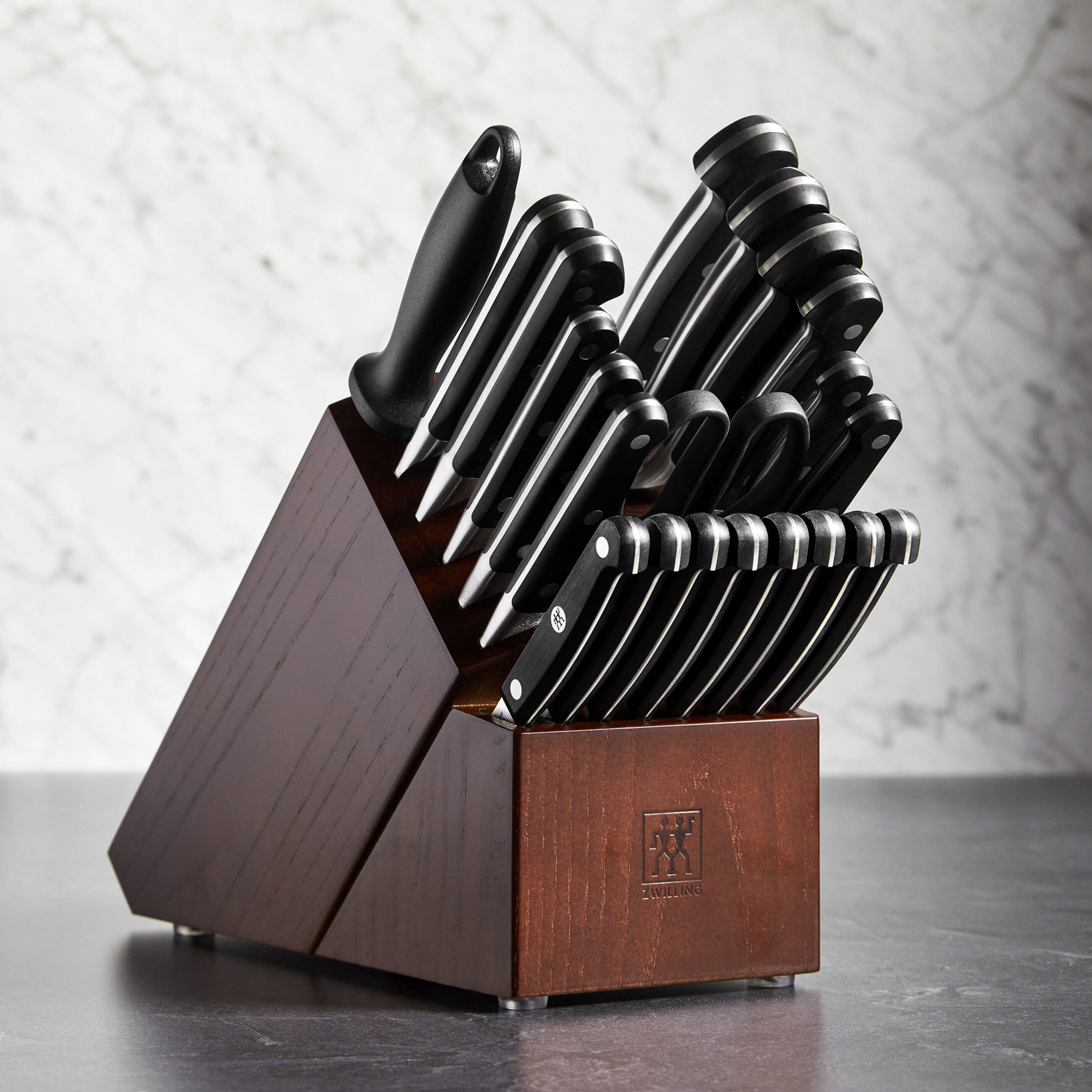 Walnut knife block on a kitchen countertop, demonstrating its stylish and functional design.