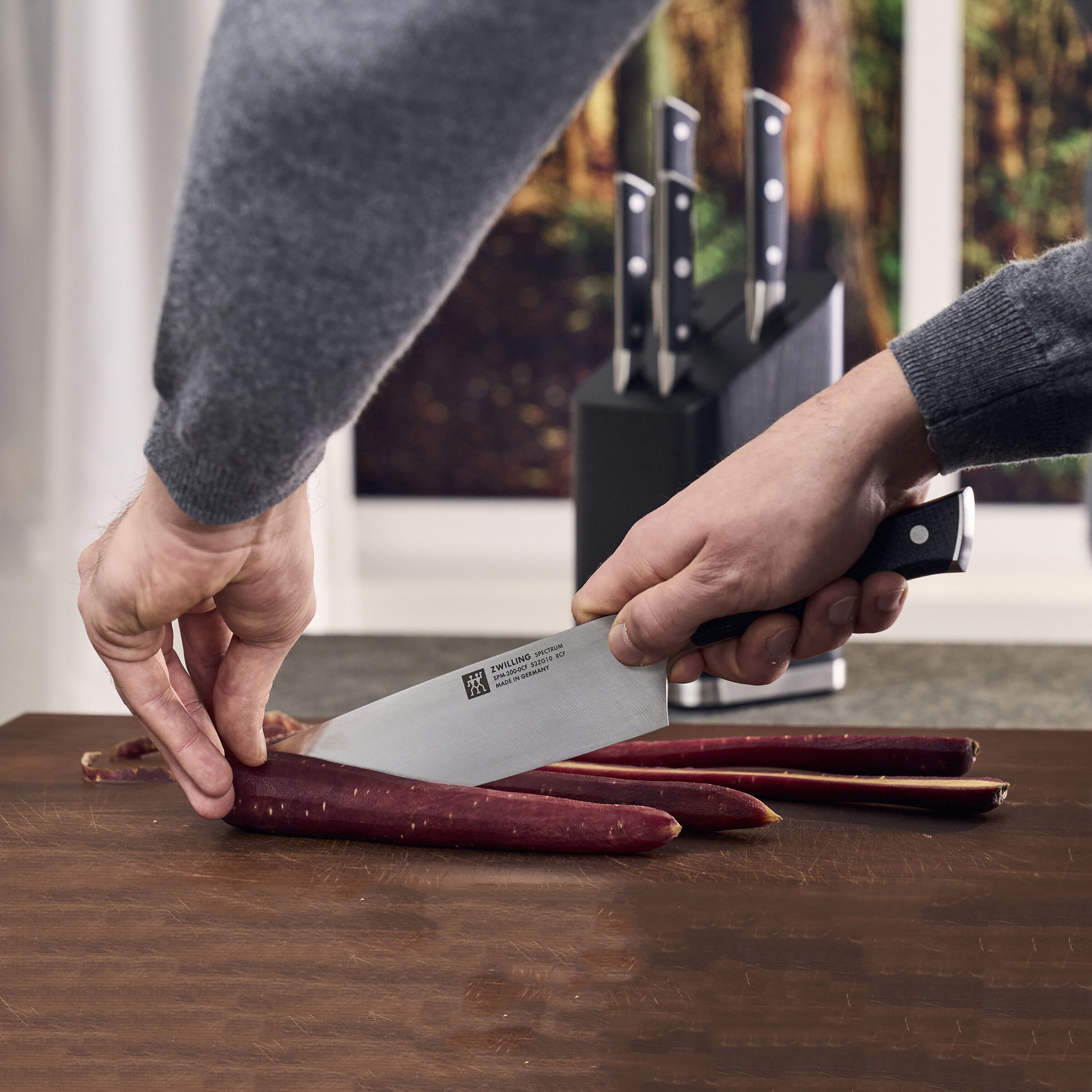 High carbon stainless steel kitchen knife in a modern kitchen setting