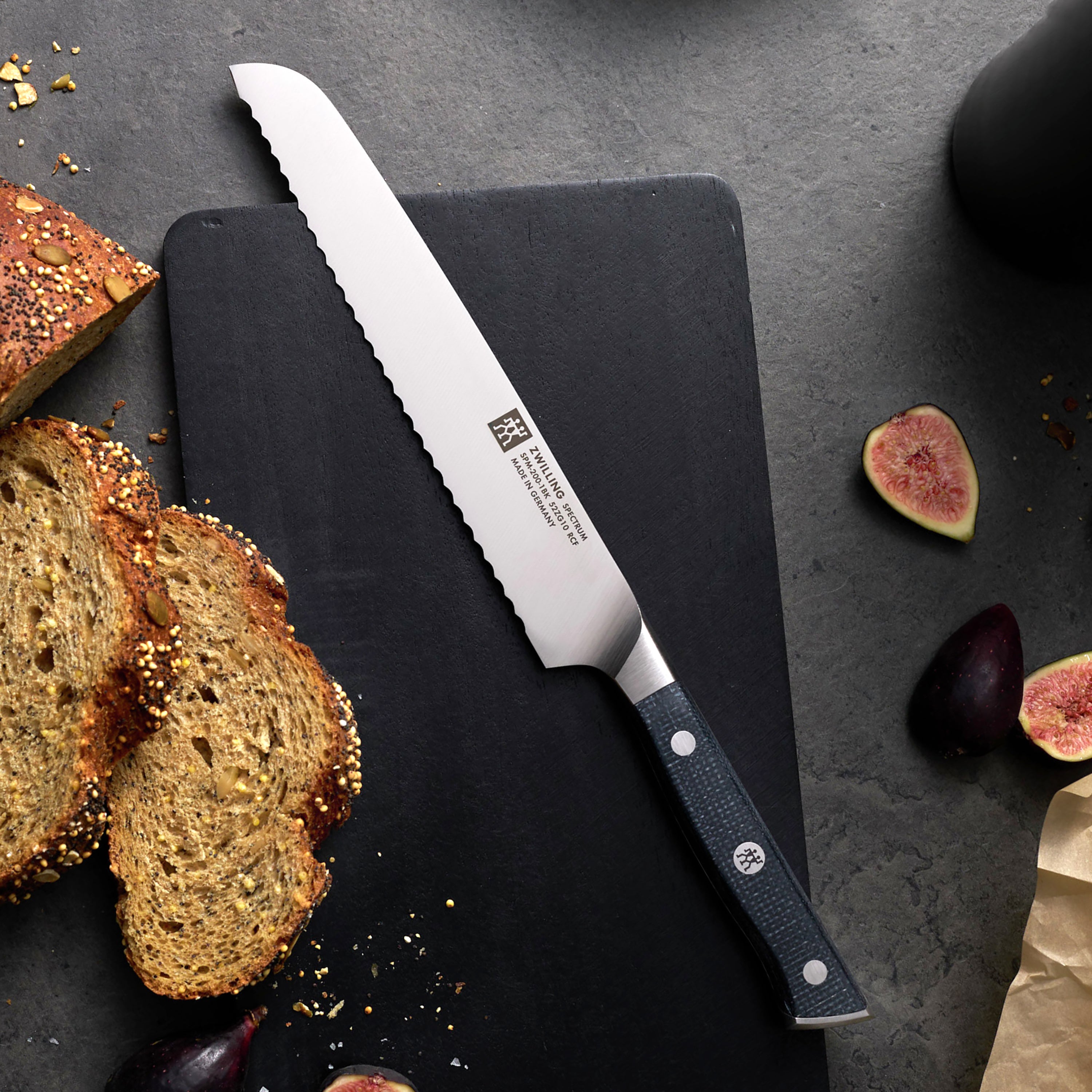 Close-up of the sharp blade and handle of Zwilling Spectrum bread knife