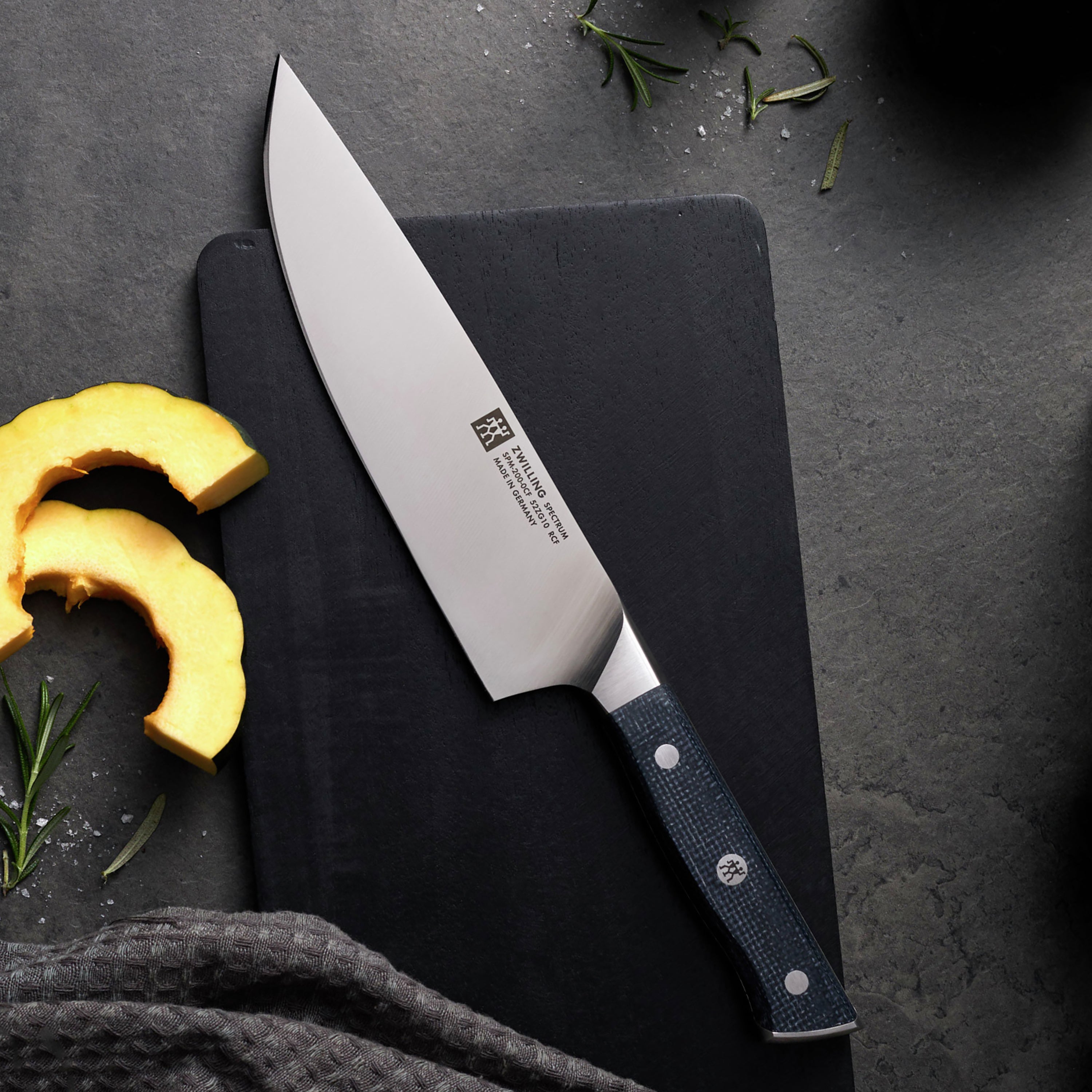 Close-up of the high carbon steel blade and full tang construction of Zwilling knives