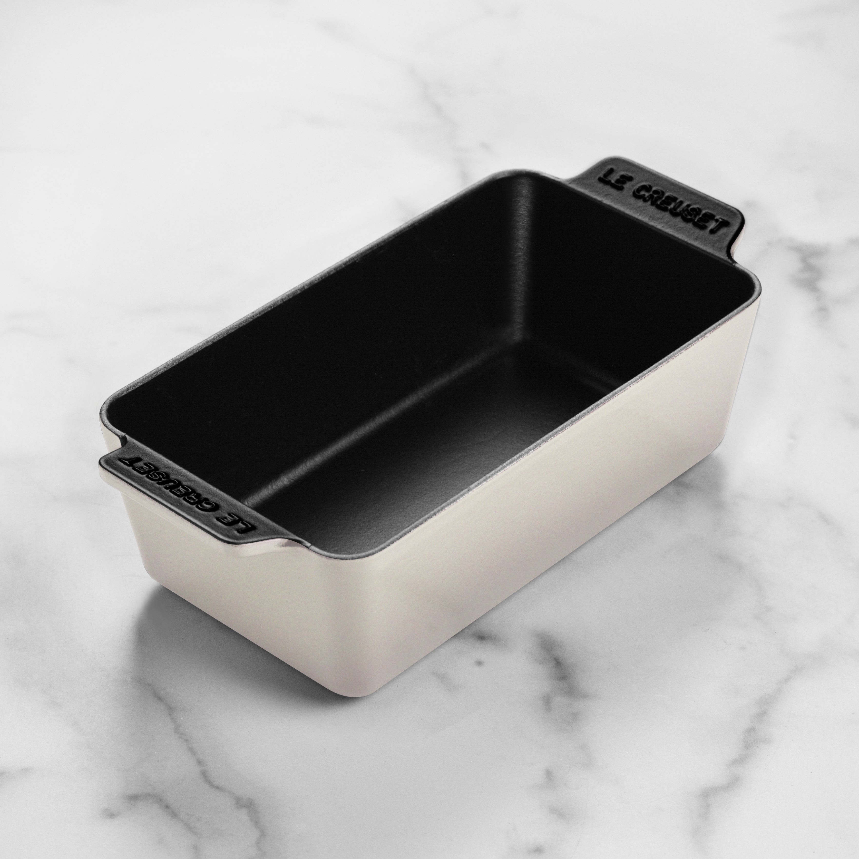 Side angle of the loaf pan with handles, ideal for transferring from oven to table