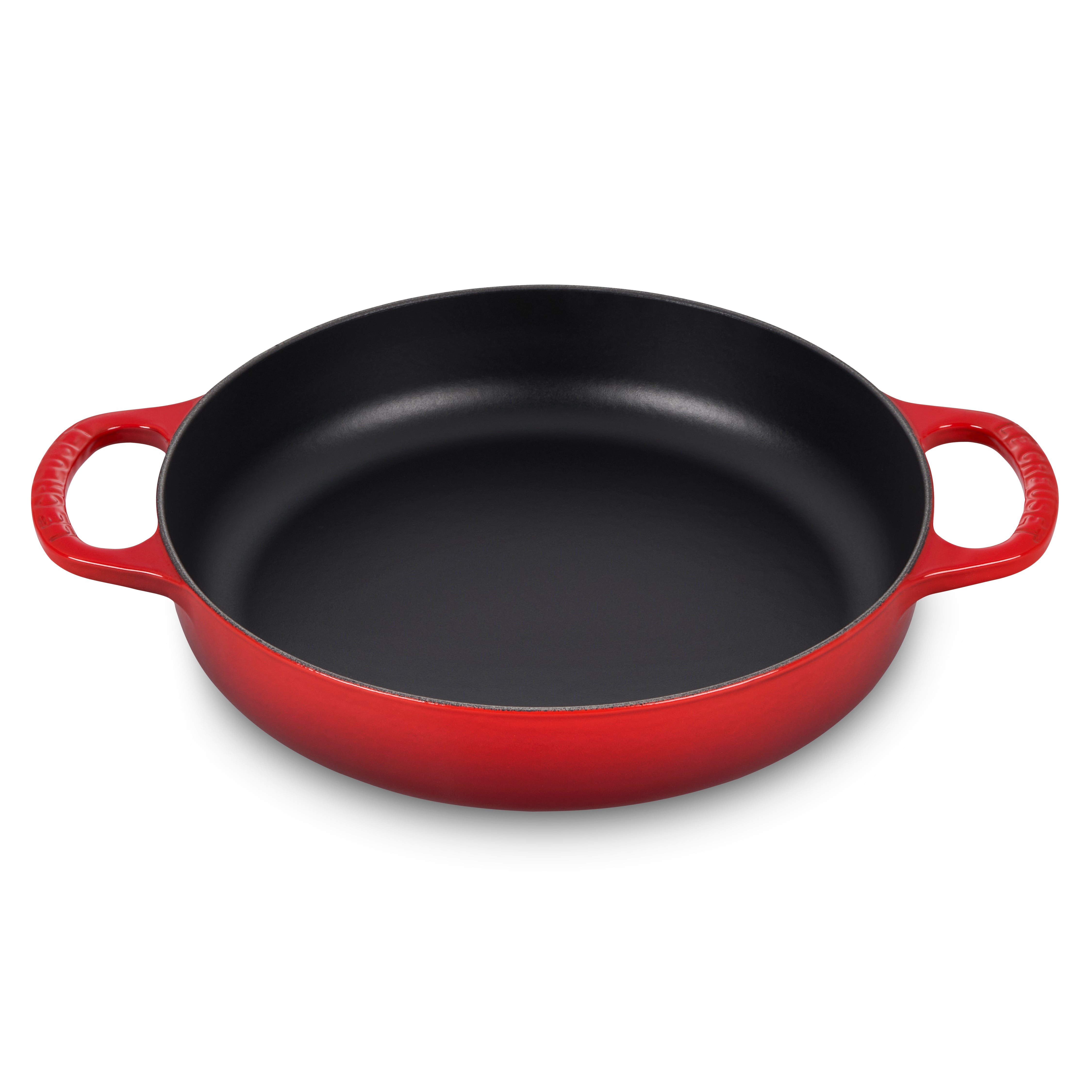 Le Creuset 11 inch cerise everyday pan showcasing its enameled finish and wide-loop handles.