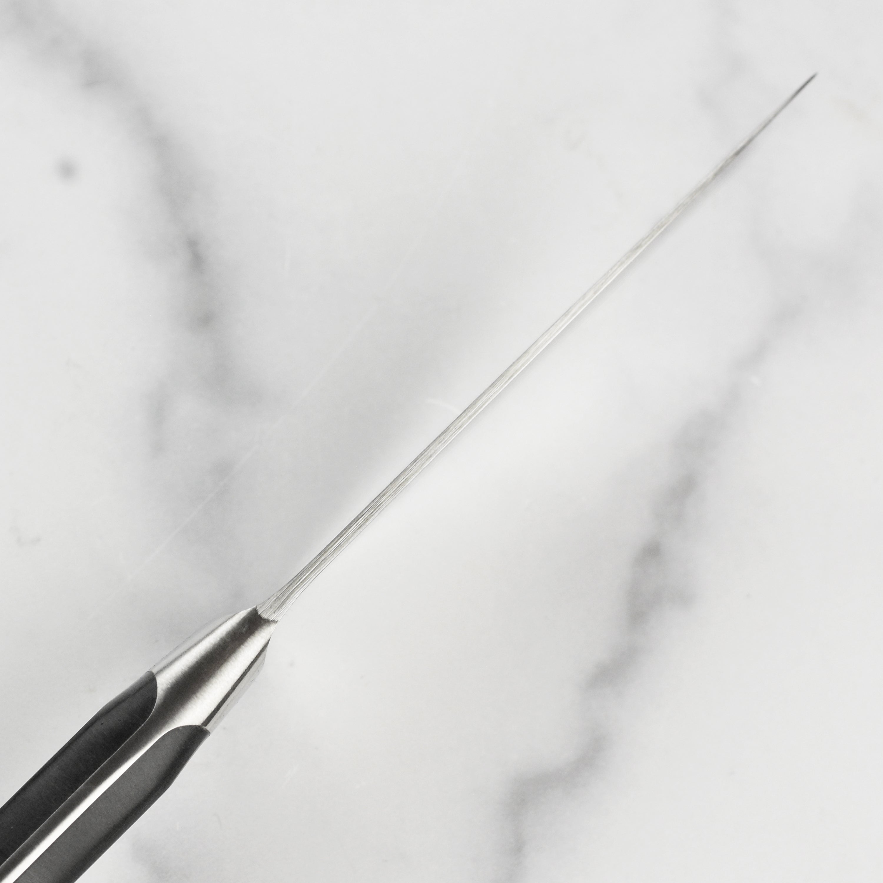 Full view of the Wüsthof Classic chefs knife with durable handle and blade