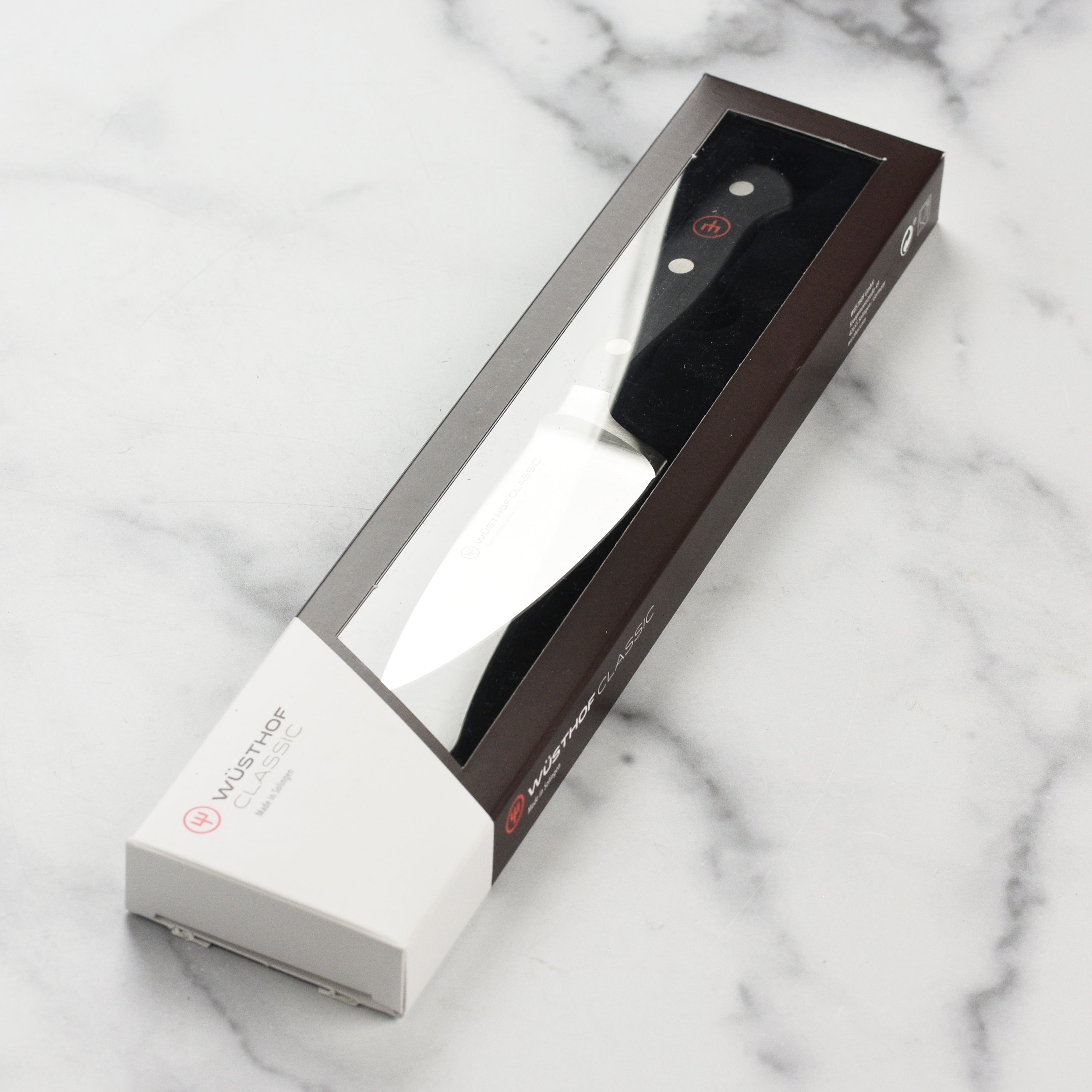 Full view of the Wüsthof Classic chefs knife with durable handle and blade