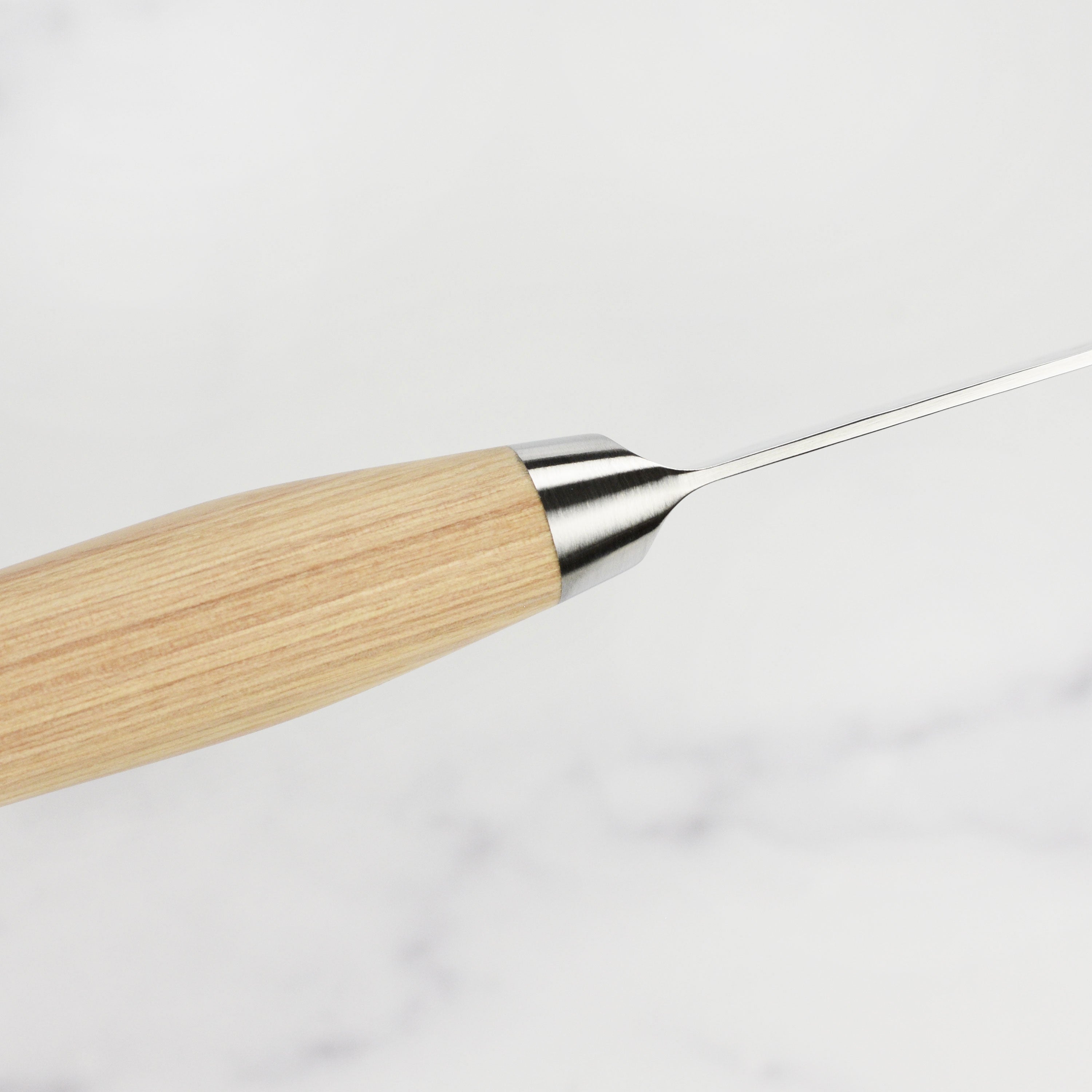 Detailed view of a Japanese chef knife from the Shun Premier Blonde collection