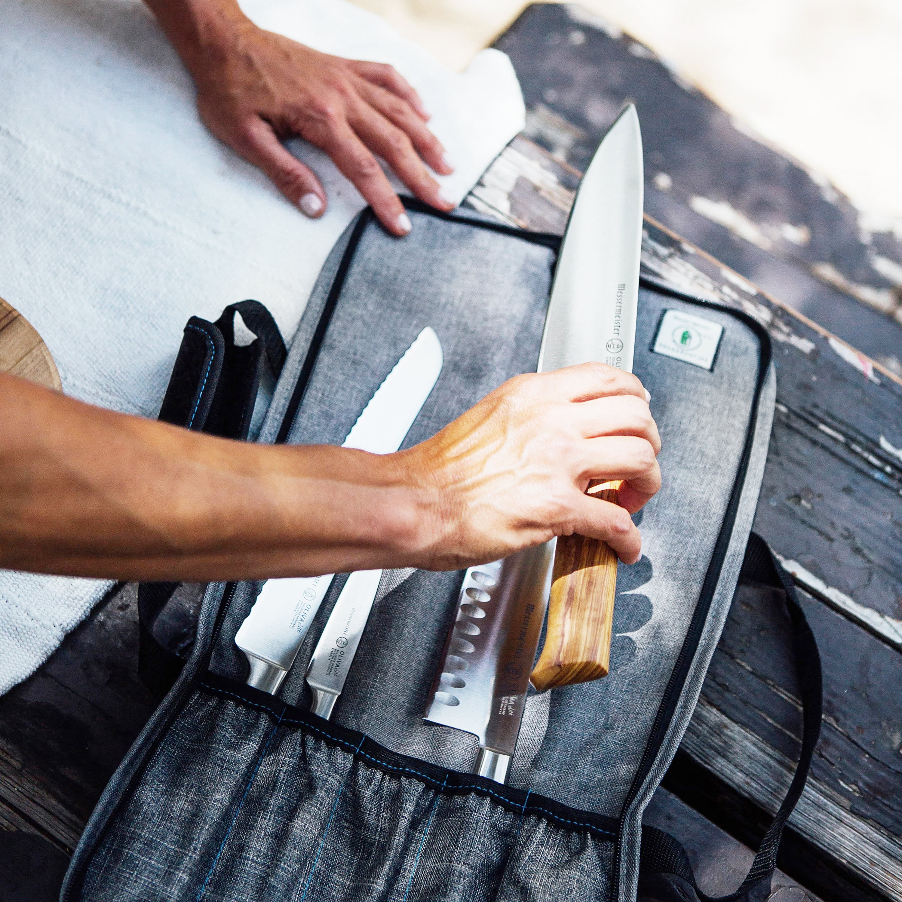 Close-up of the heavy-duty YKK zippers on the knife roll.