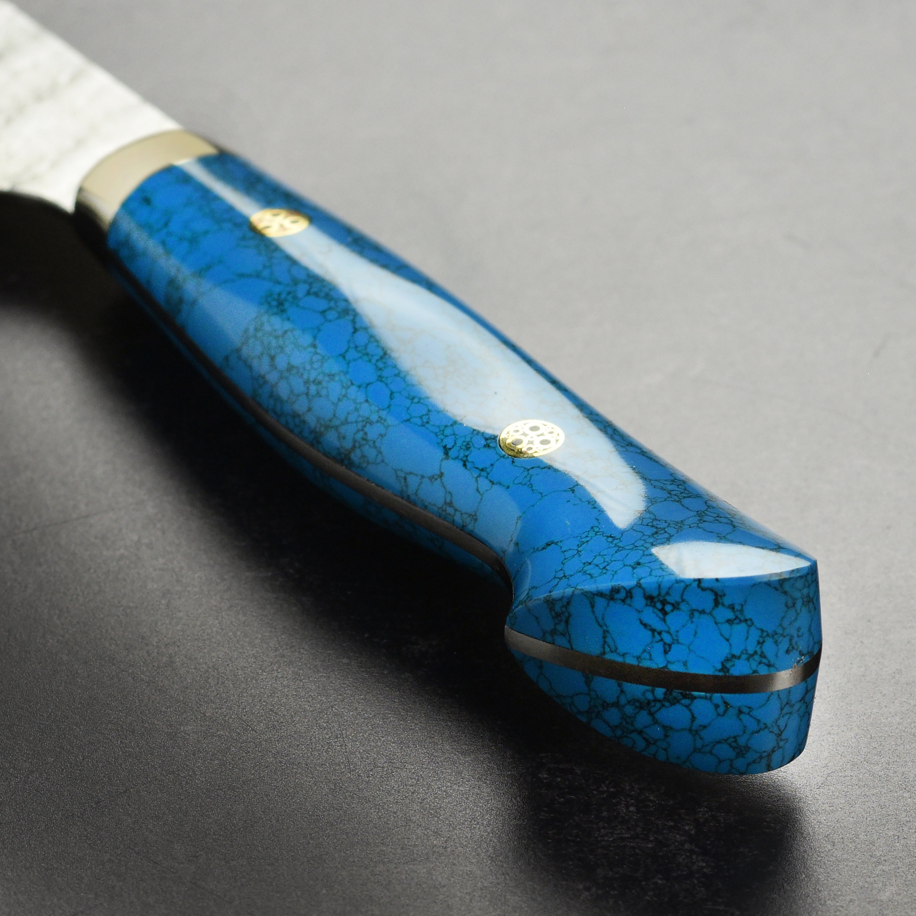 Close-up of the SG2 high carbon steel blade edge on the Nigara gyuto knife