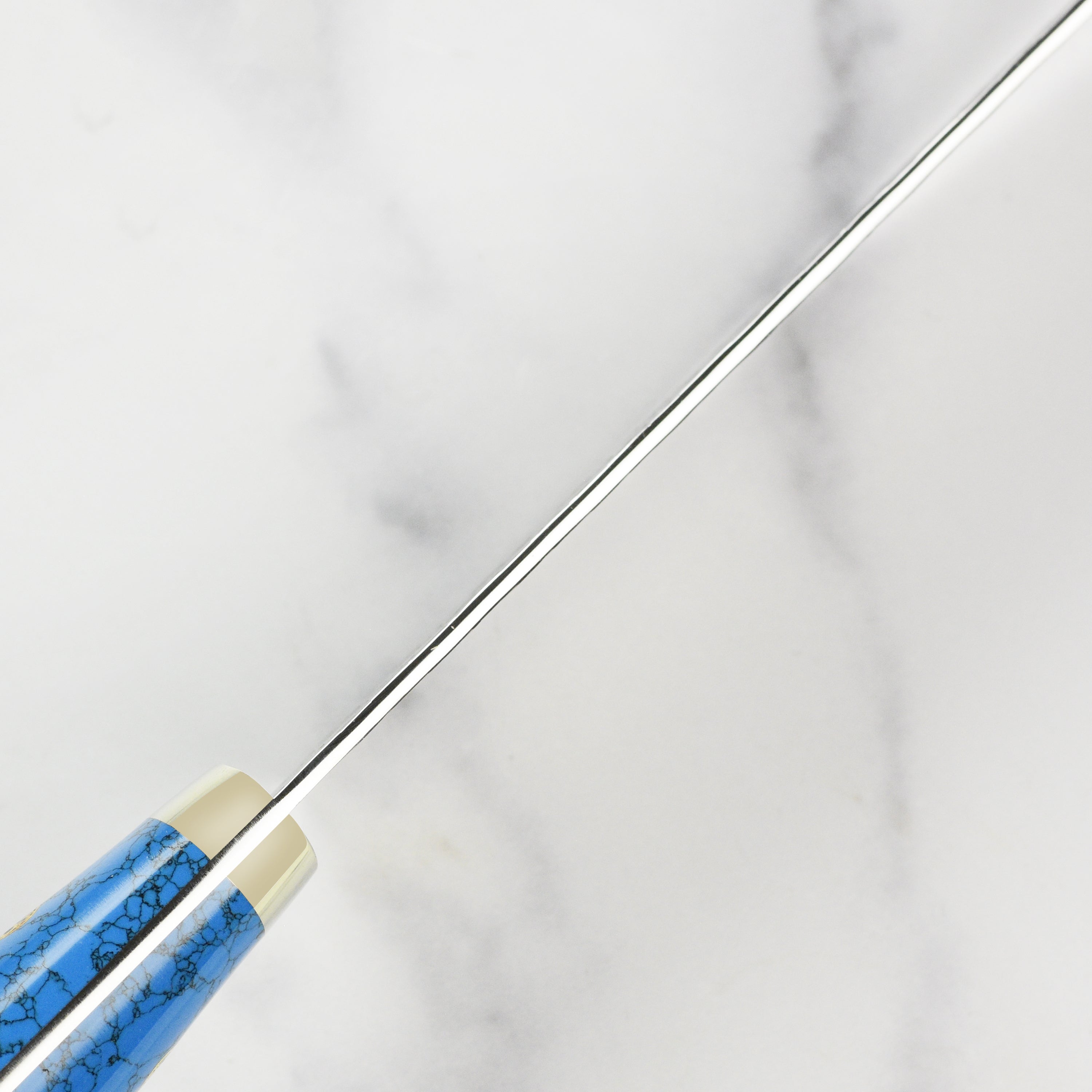 Profile view of Nigara SG2 Kiritsuke knife, showcasing its elegant design and quality materials.