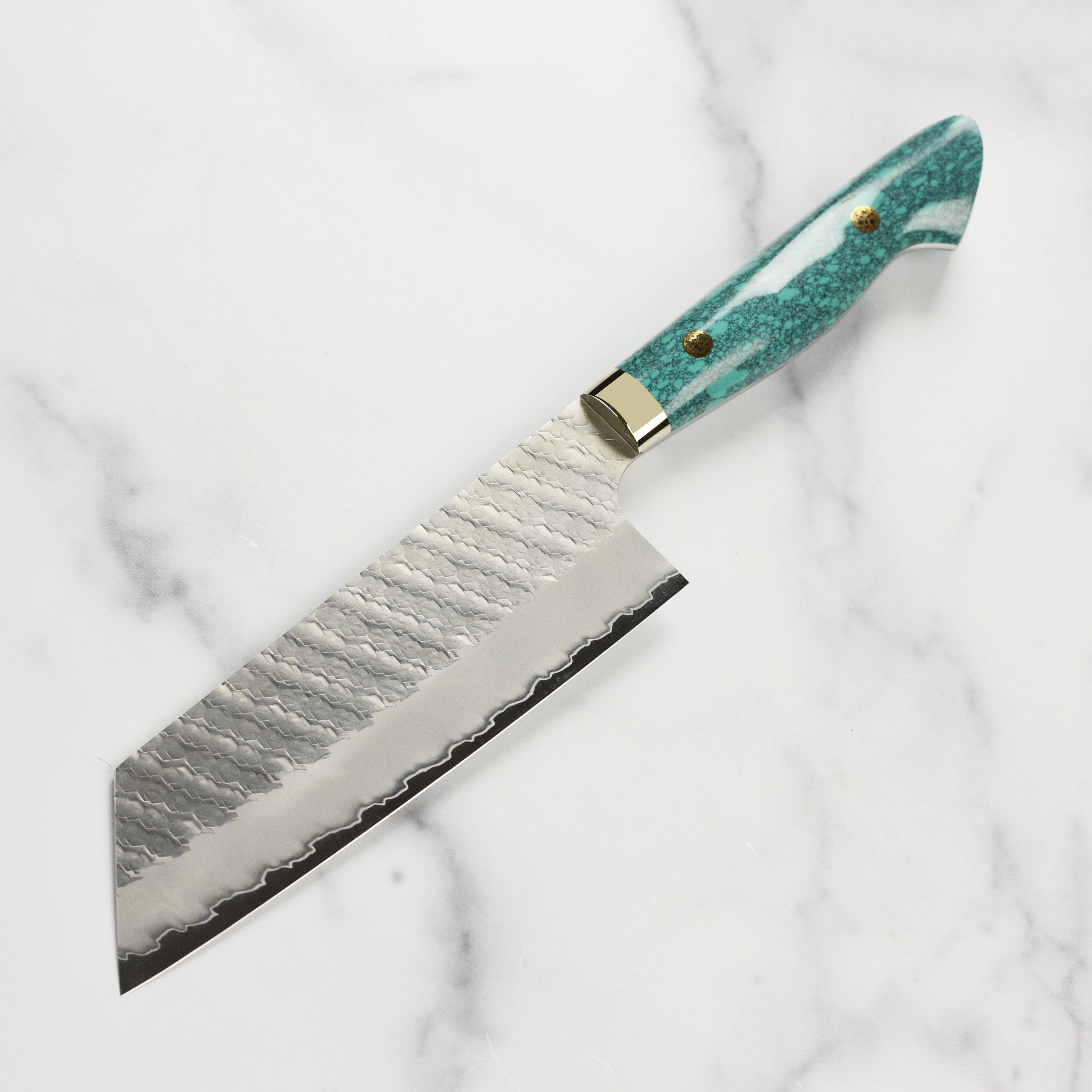 Elegant high quality kitchen knife displayed with vegetables for professional cooking