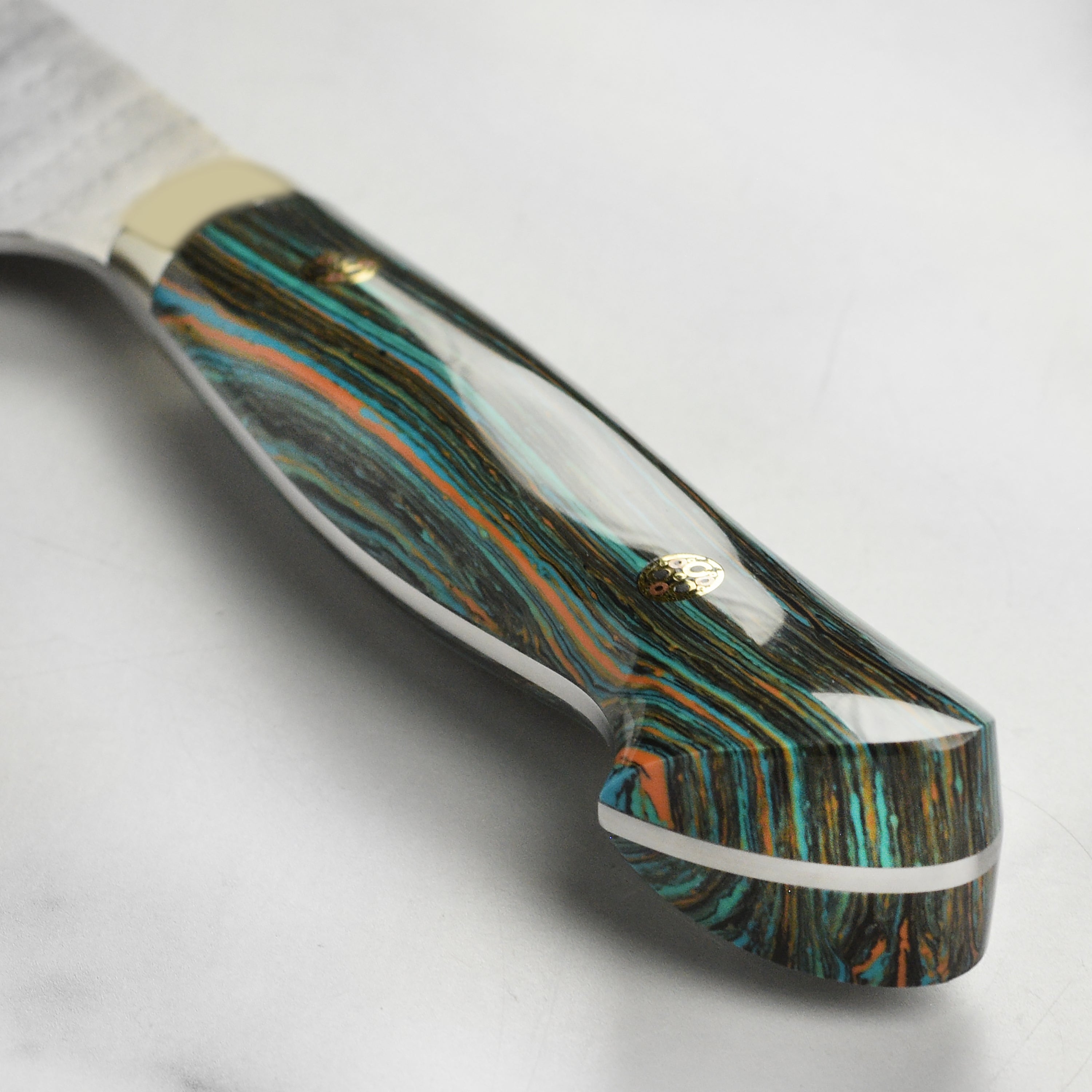 Close-up of the sharp blade of the SG2 Kiritsuke Nakiri knife, perfect for precision cutting.