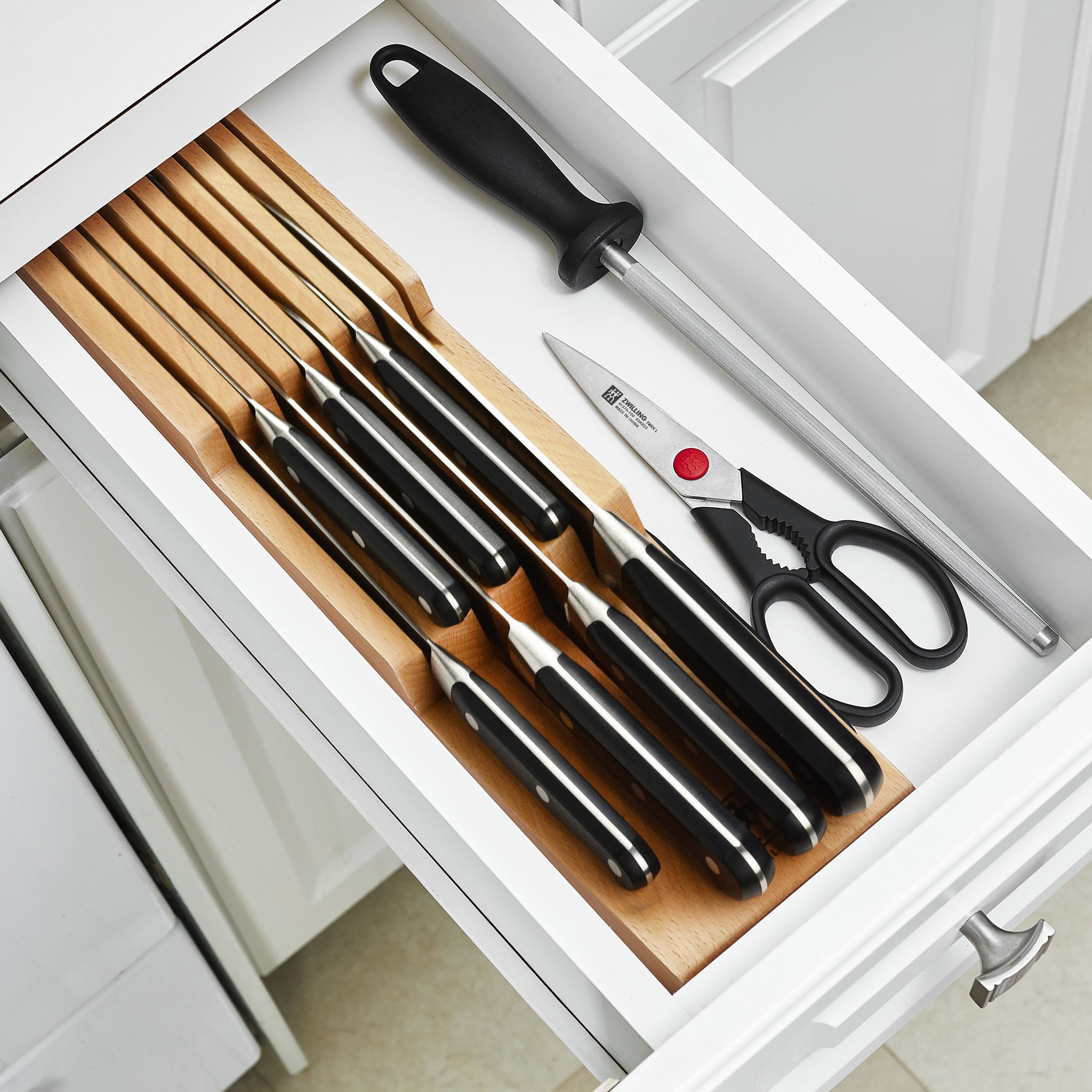 Close-up of Zwilling Professional S chef knives with high carbon stainless steel blades
