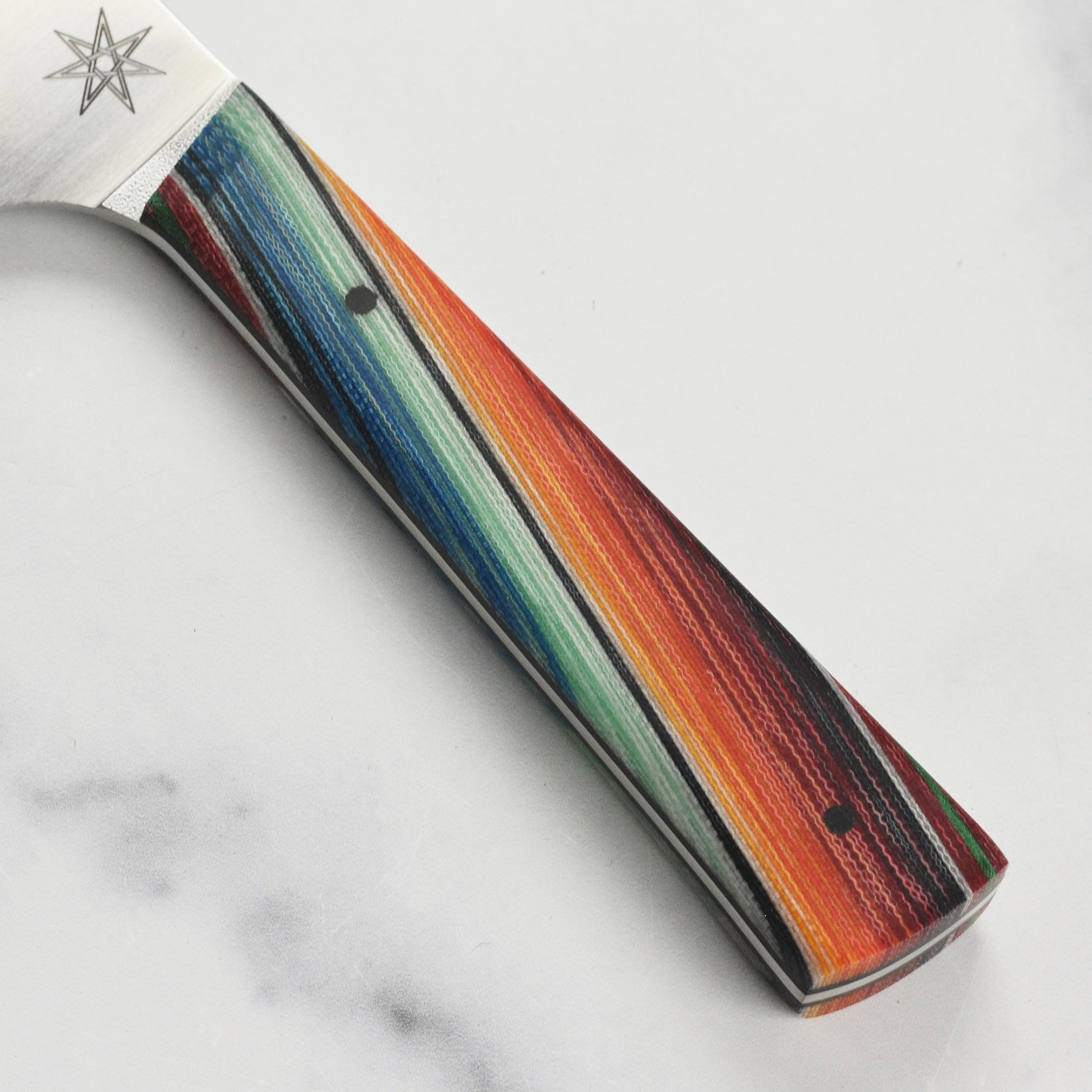 Baja Pro chefs knife in action, slicing fresh vegetables effortlessly on a cutting board.