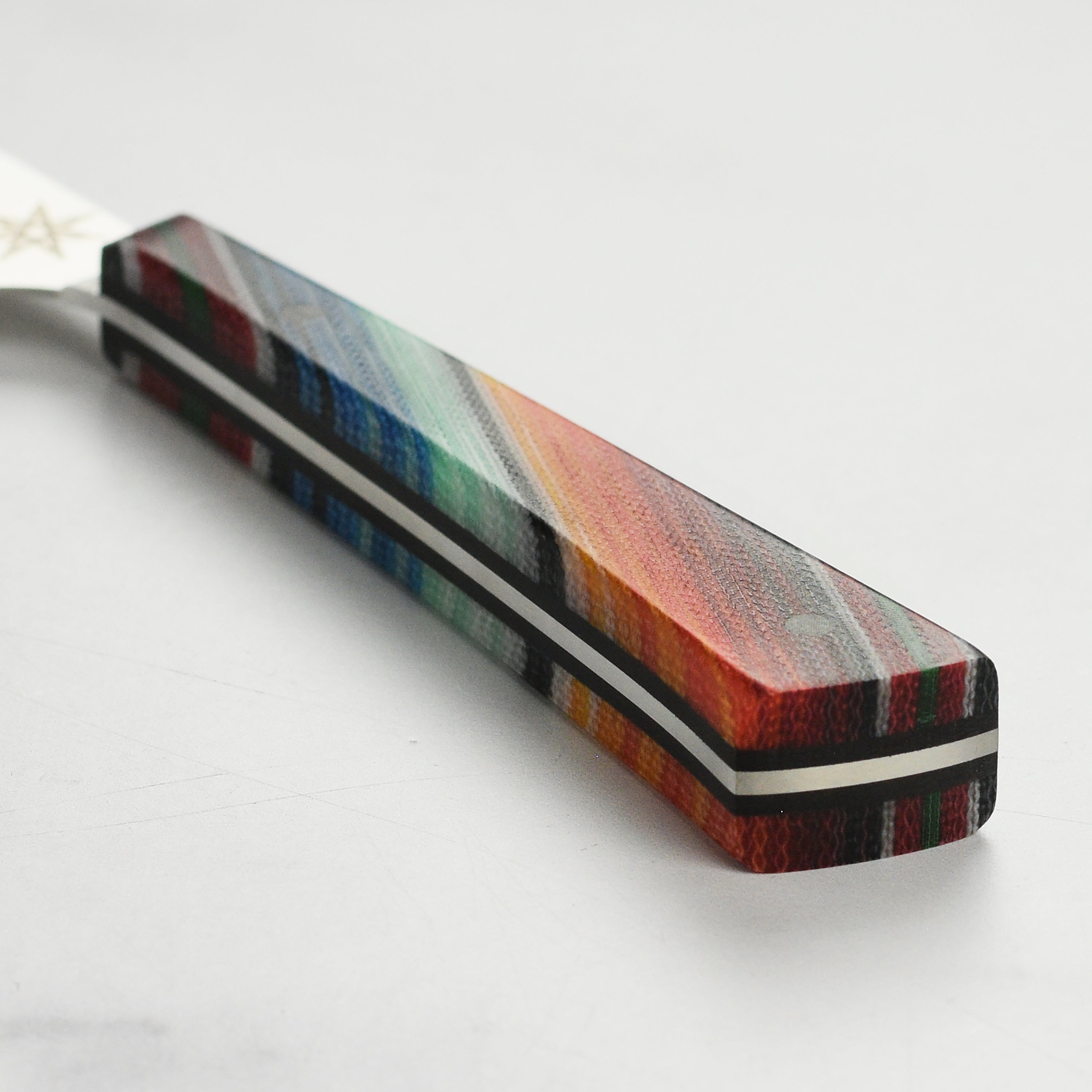 Close-up of the Nitro-V steel blade on a handmade kitchen knife
