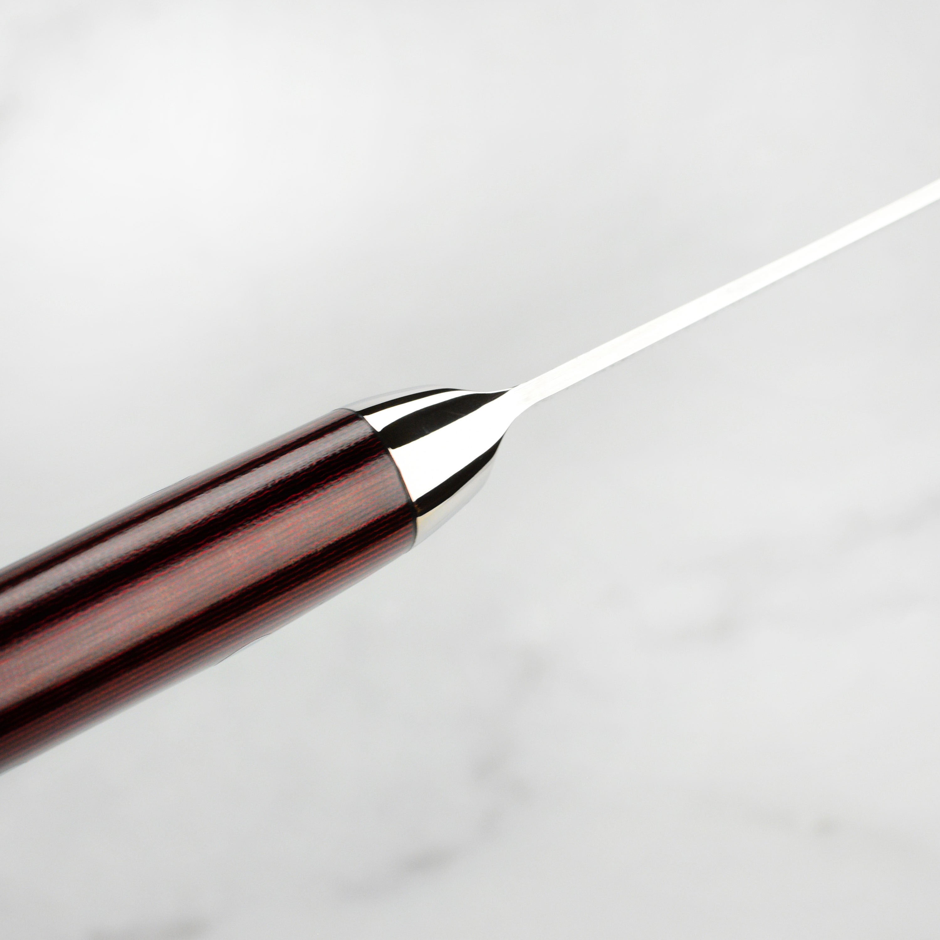 Detailed view of the handcrafted handle and full tang construction