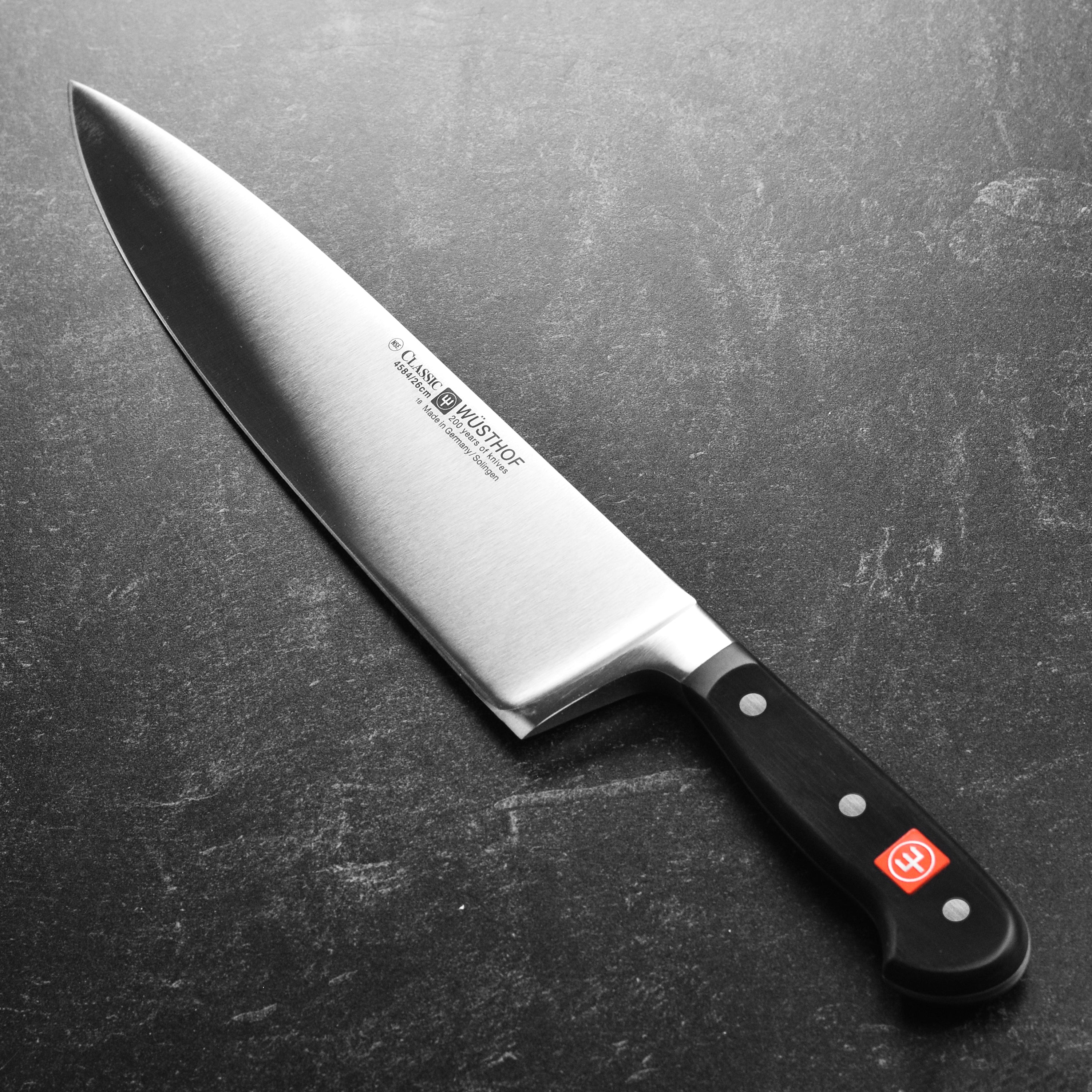Close-up of the Wusthof knife edge and original logo detailing