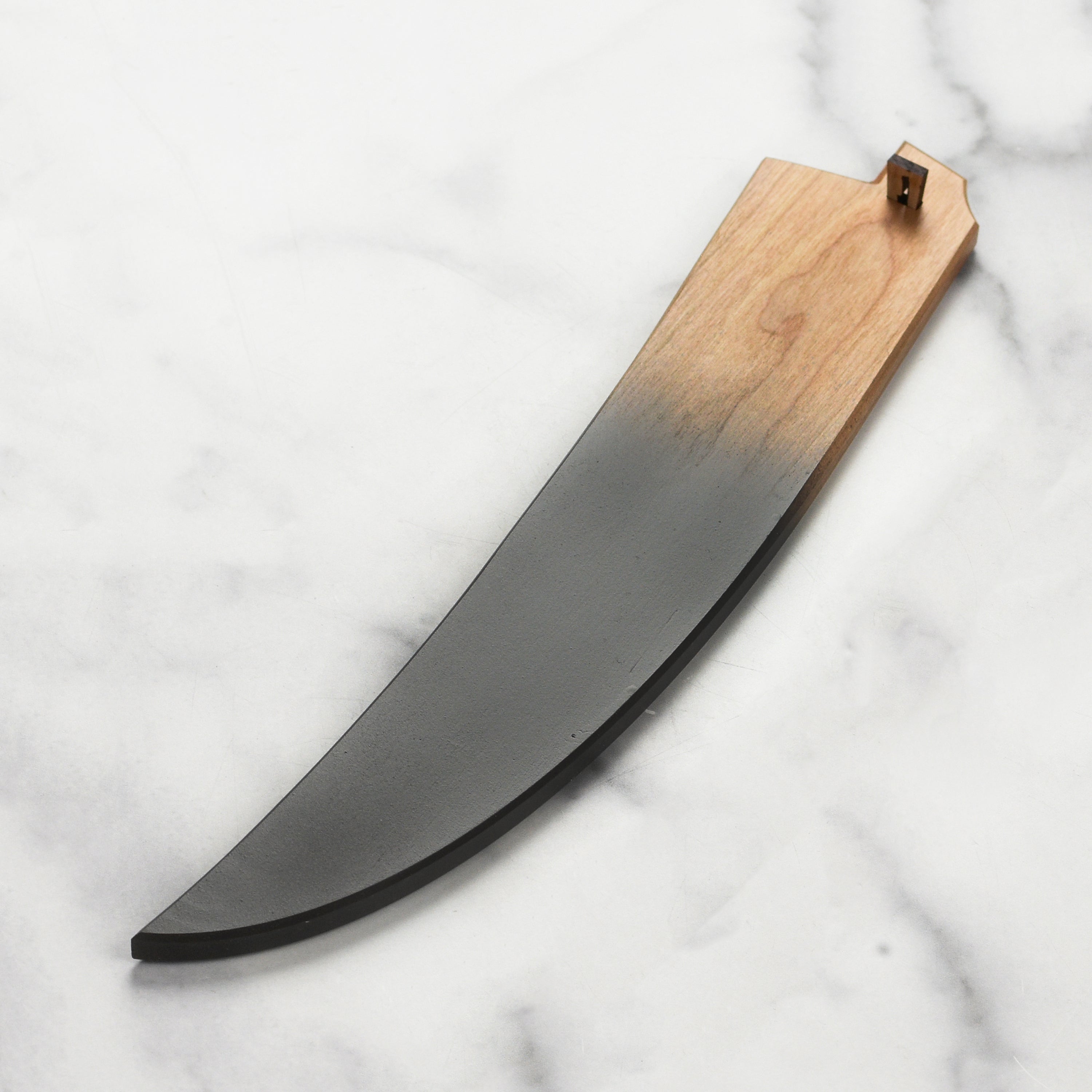 Side view of the Blue Saya knife sheath showcasing its cherry wood design.